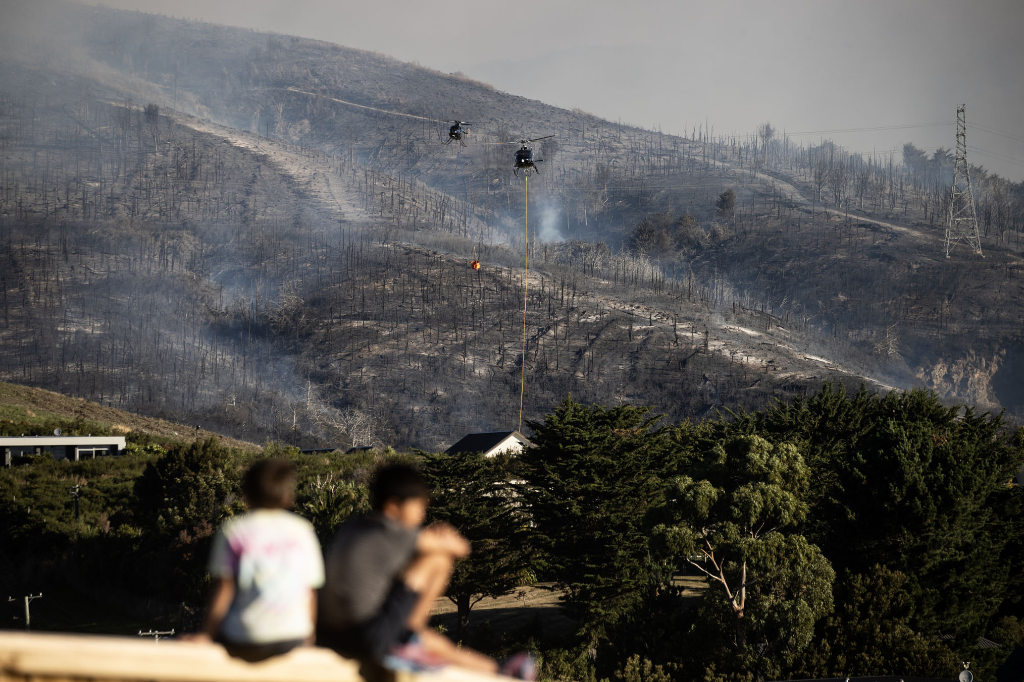 Firefighters battling a fire on Christchurch's Port Hills.
Photo / George Heard