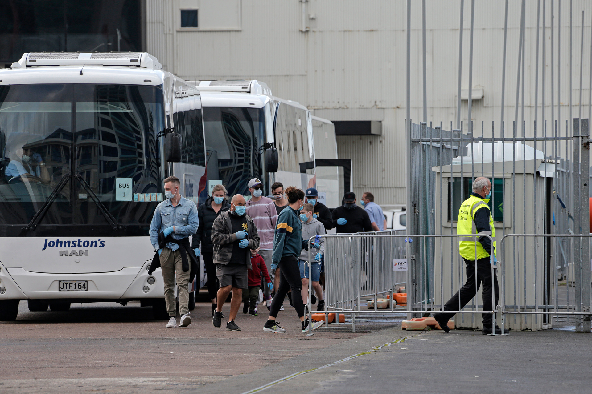 People in managed isolation are bused to their exercise area at Queens Wharf on the Auckland waterfront in August. Photo / Alex Burton