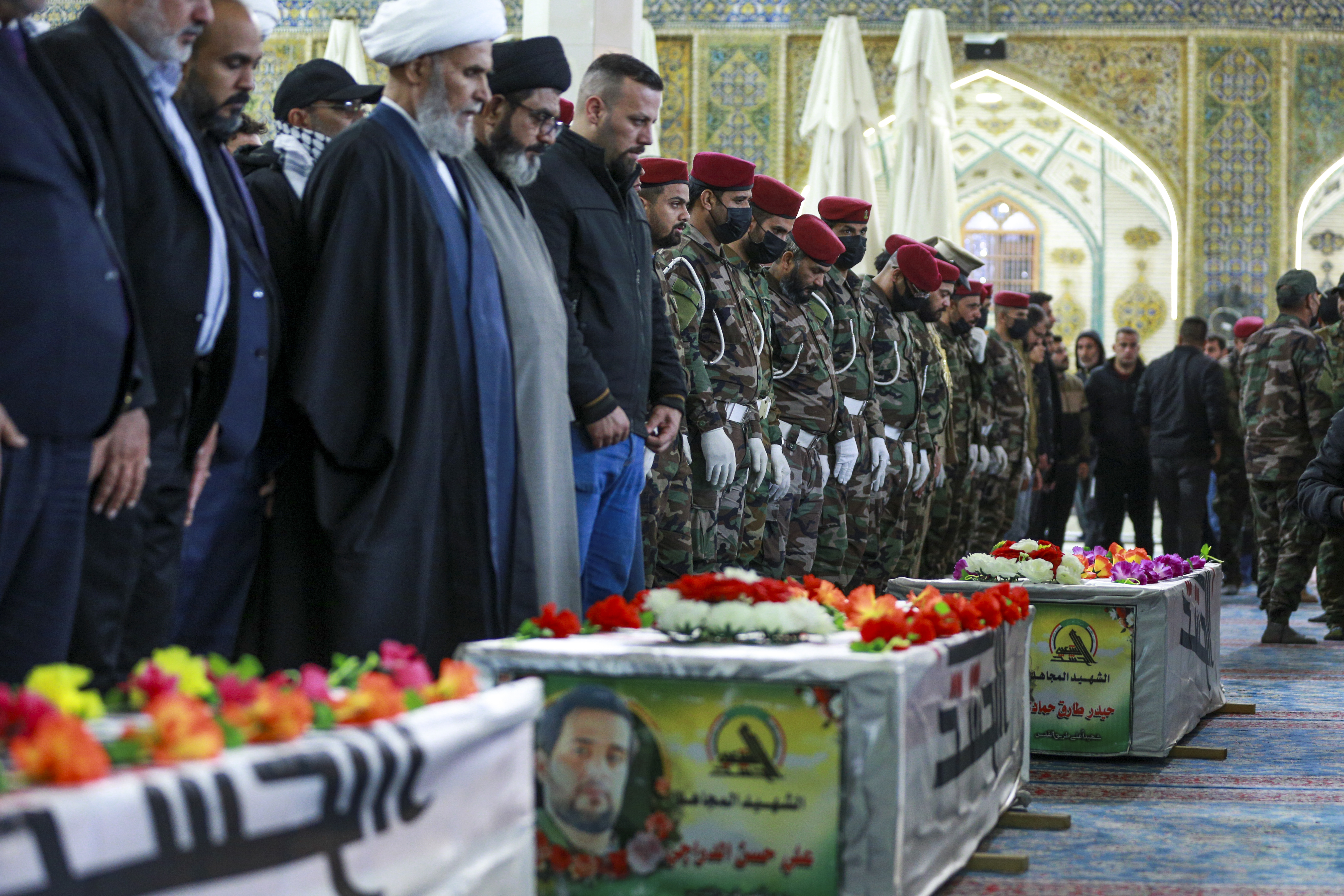 Iraqis attend the funeral in Najaf for members of Kataib Hezbollah, an Iran-backed militia. Photo / AP