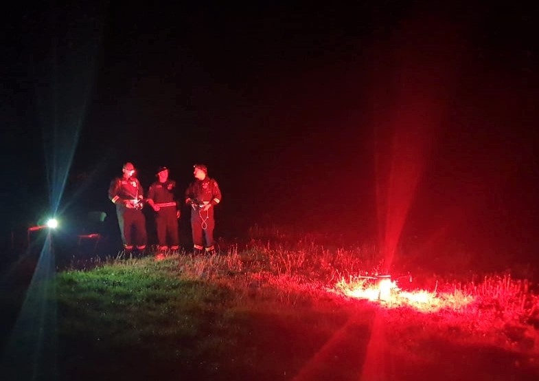 A team from Fenz Urban Search and Rescue prepare to put up a drone to check for hotspots. Photo / Fenz