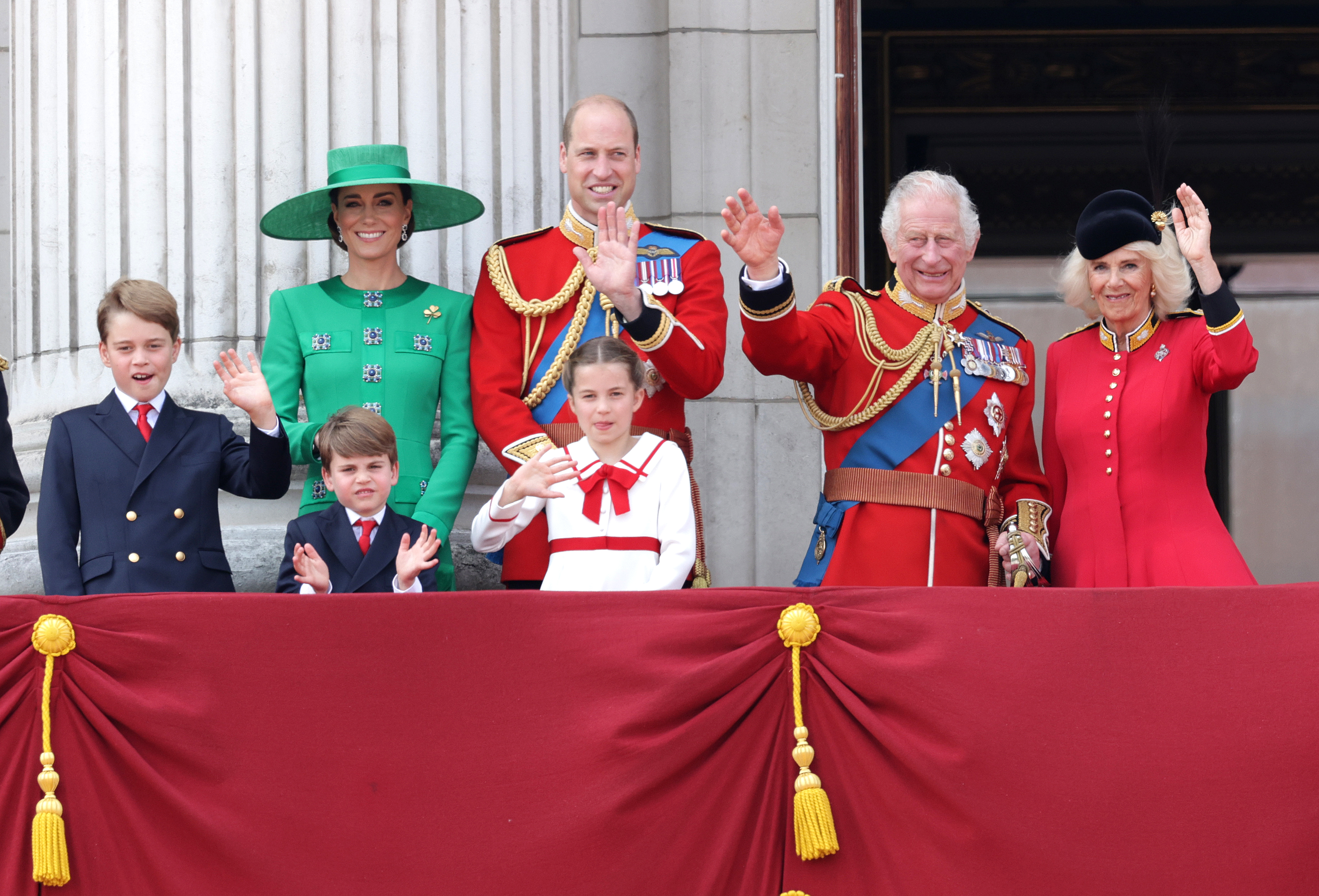 King Charles and Queen Camilla alongside the Prince and Princess of Wales and their children Prince Louis, Princess Charlotte and Prince George on the Buckingham Palace balcony. Photo / Getty Images