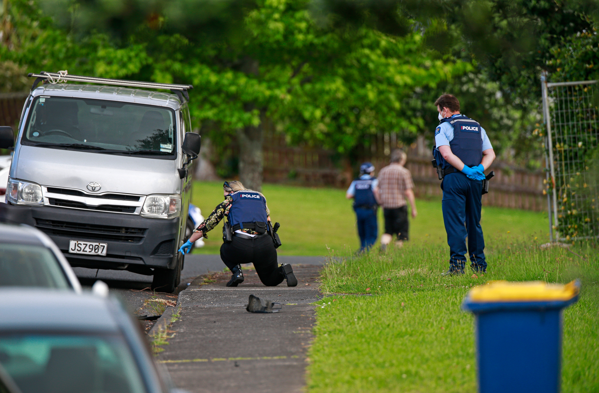 Armed police officers at Virgo Place in Glen Eden. Photo / Alex Burton 
