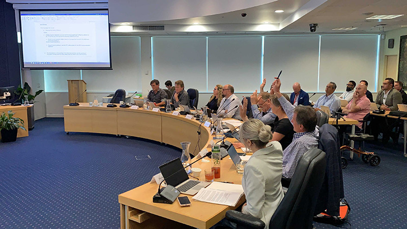 Tauranga City councillors vote in an extraordinary meeting today. Photo / George Novak