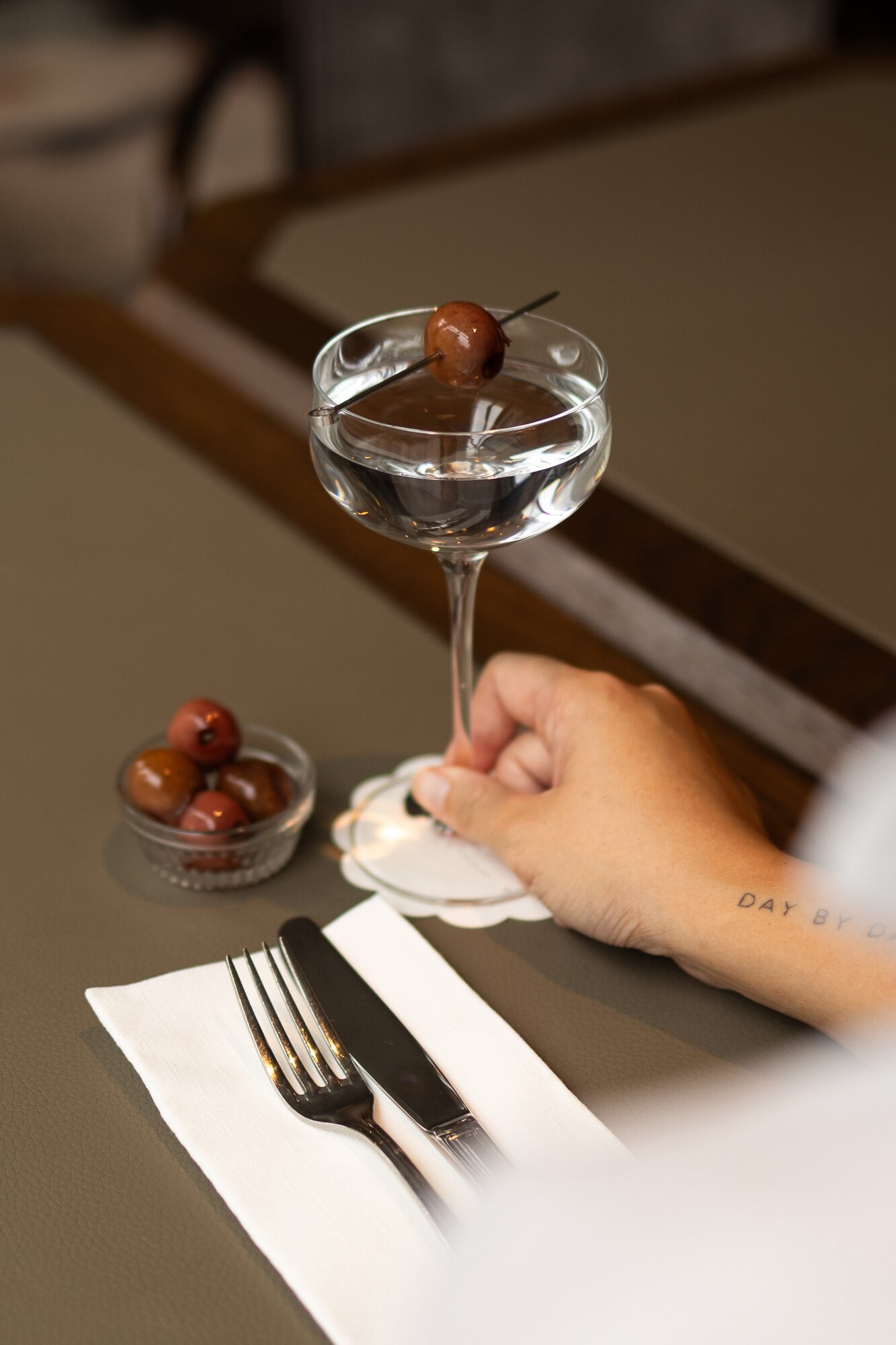 A blanc cosmo, made by Gilt bartender Justin Ydia from Belvedere vodka, creme de cacao blanc, yuzu curacao and lime.