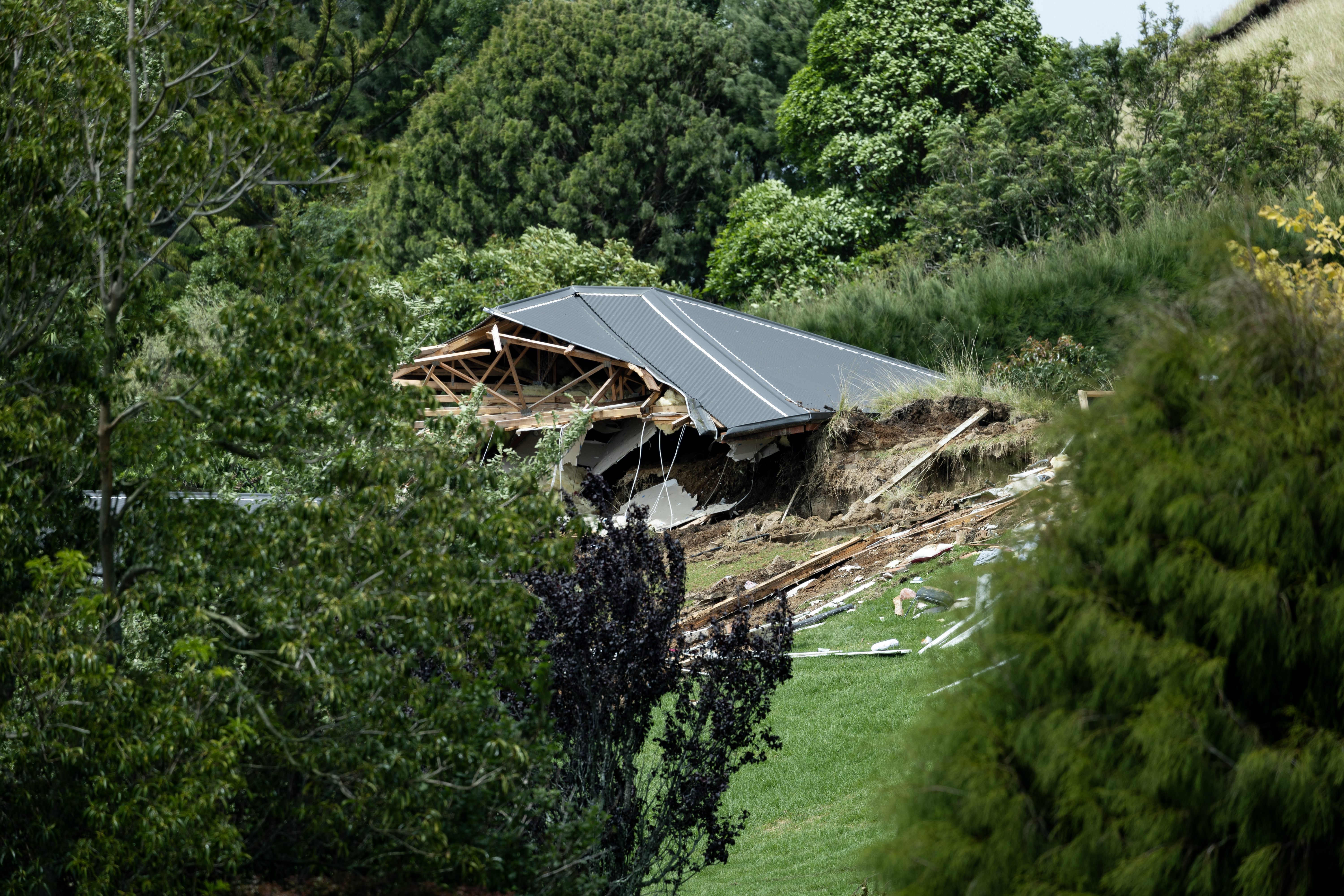 A grandmother and her grandson died in a landslide on Welcome Bay Rd, Pāpāmoa. Photo / Dean Purcell
