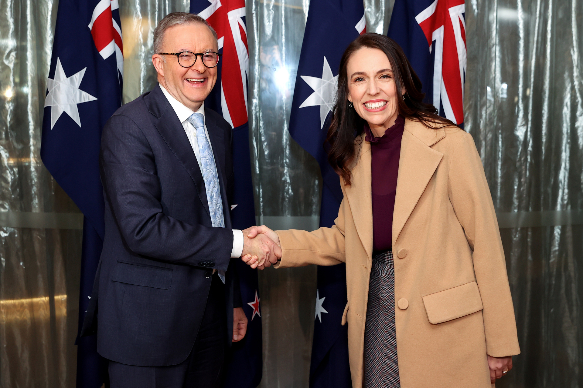 Anthony Albanese, Australia's prime minister, left, and Jacinda Ardern, New Zealand's prime minister, shake hands. Photo / Getty Images