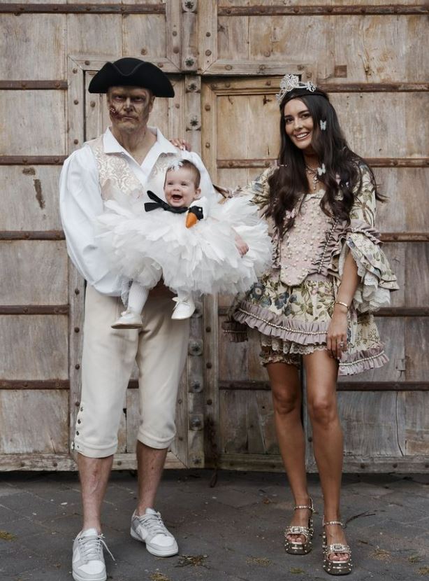 Nick Mowbray and Jaimee Lupton with their daughter Noa at the Halloween party they hosted at their new Herne Bay property.