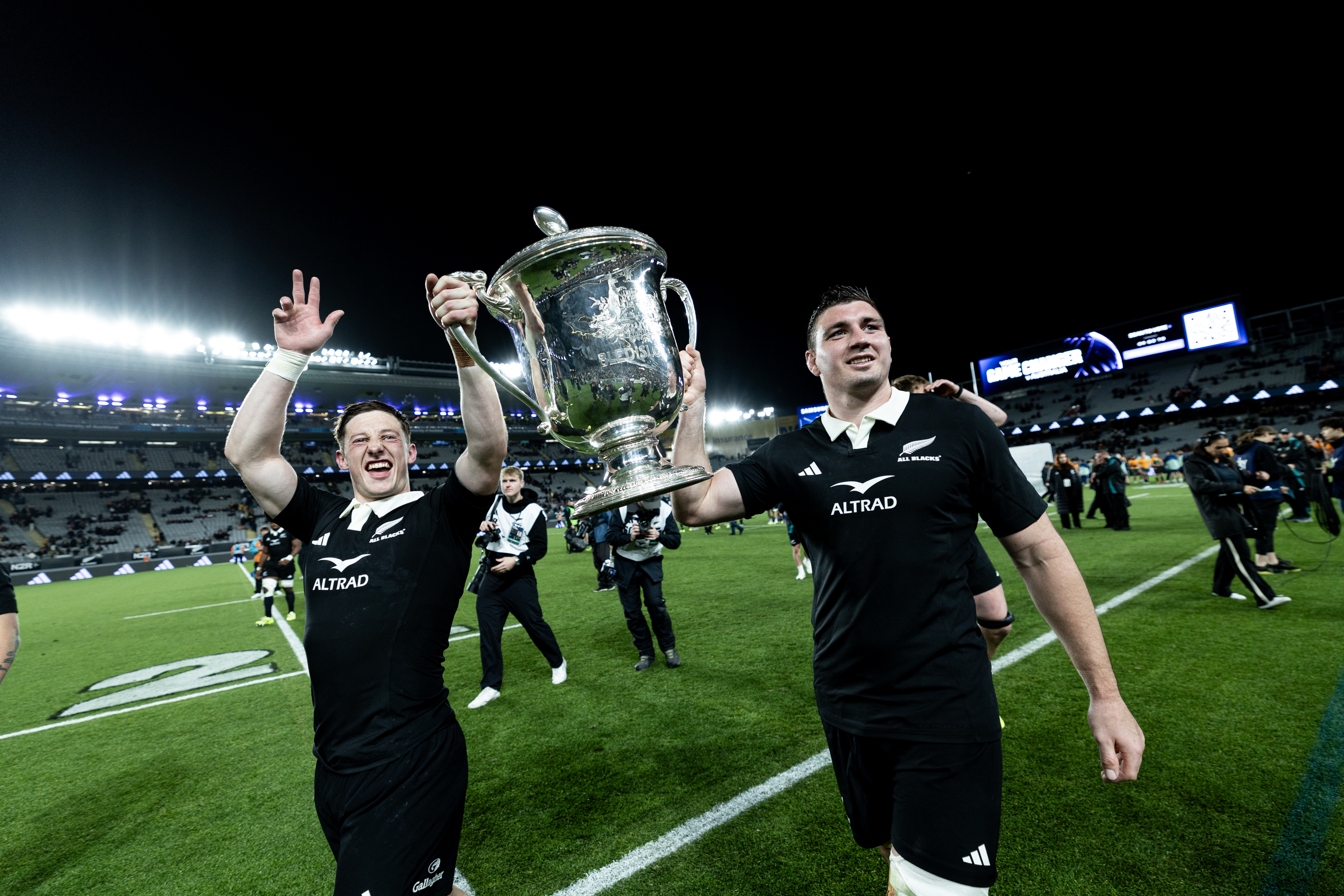 Cam Roigard and Simon Parker celebrate retaining the Bledisloe Cup. Photo / Dean Purcell