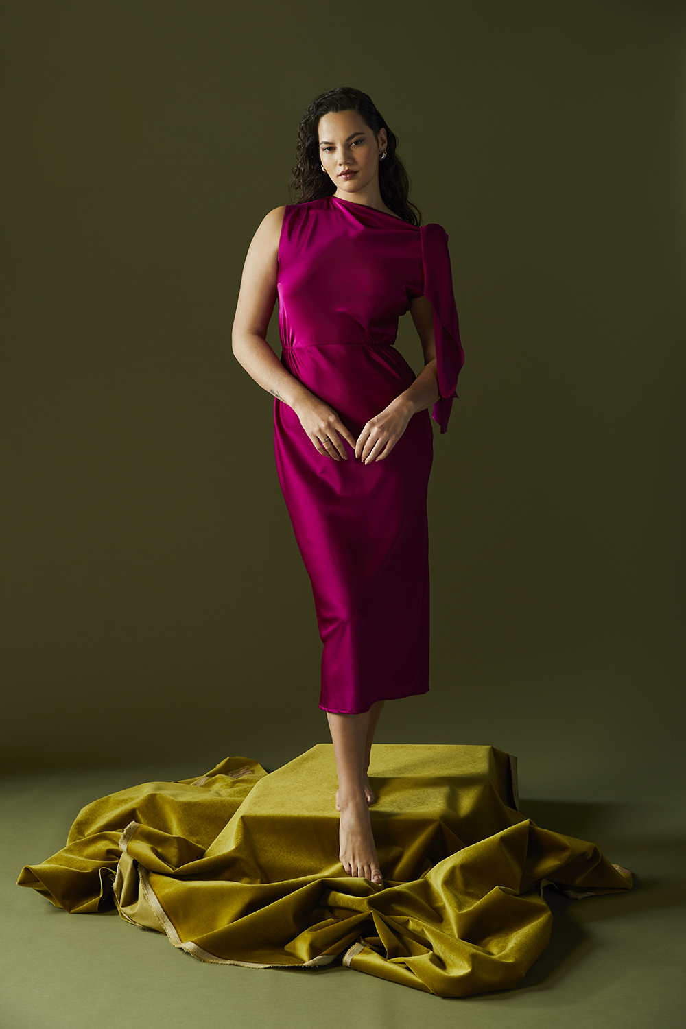 Taylah wears custom Su’mar dress. Sophie Buhai earrings, from Simon James. Demarson earrings, from Muse. Studio velvet fabric, from Martha’s Furnishing Fabrics. Photo / Mara Sommer