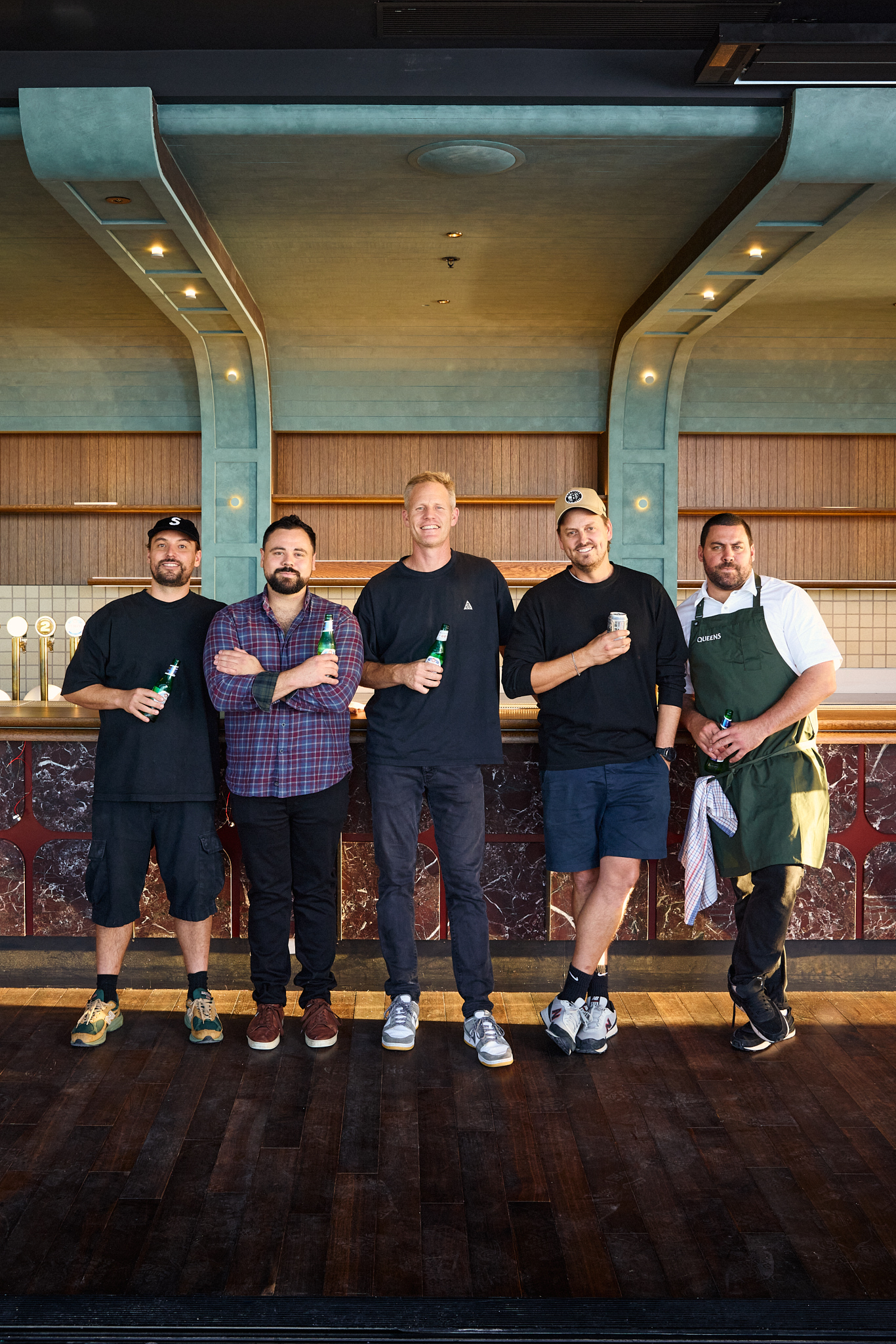 Queens Rooftop & Wineshop founders Kristian Lloydd, Reuben Ruscoe, Andrew Roborgh, Callum O'Brien and Maia Atvars. Photo / Jake Dennis