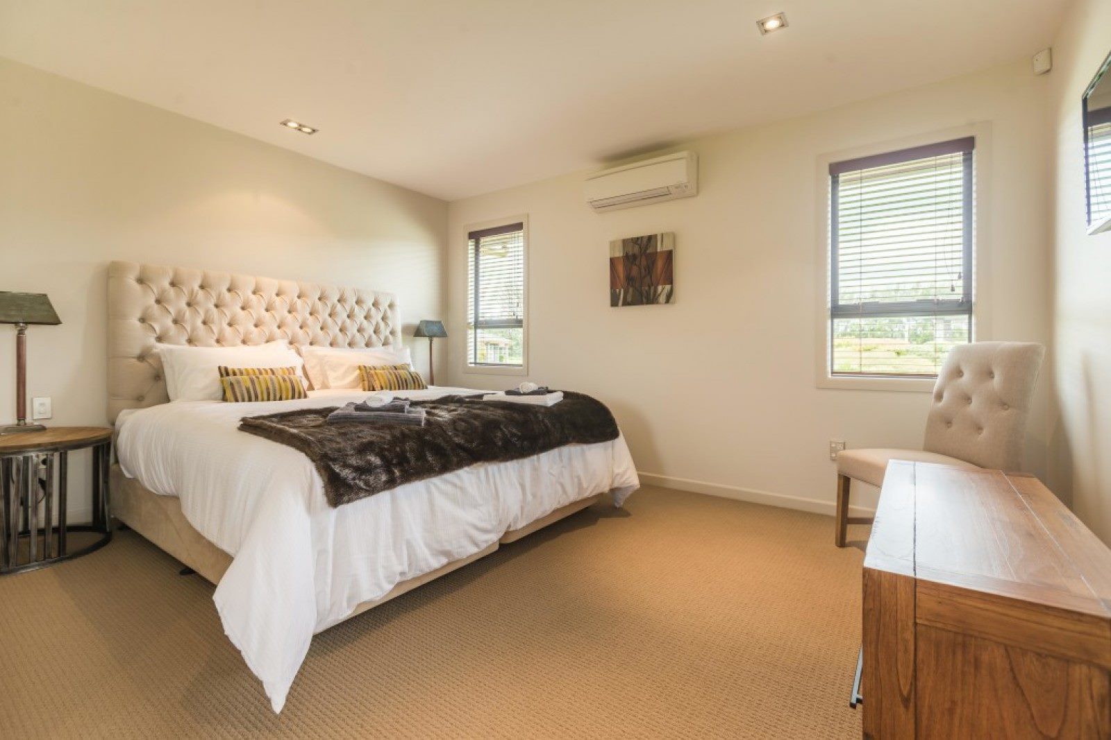 The chalet bedrooms are spacious at Resolution Retreats. Photo / Supplied