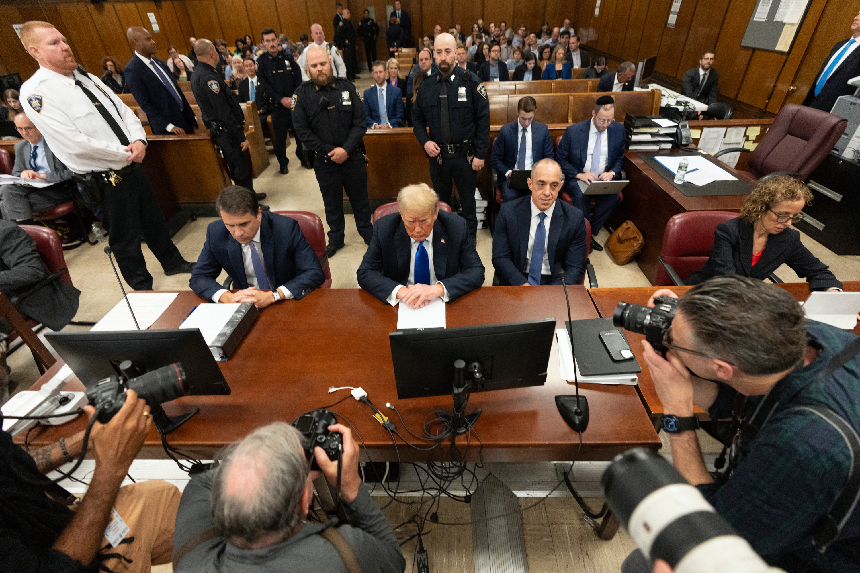 Former US president Donald Trump (centre) at Manhattan criminal court awaits the jury's verdict during his criminal hush money trial in New York. Photo / New York Post via AP