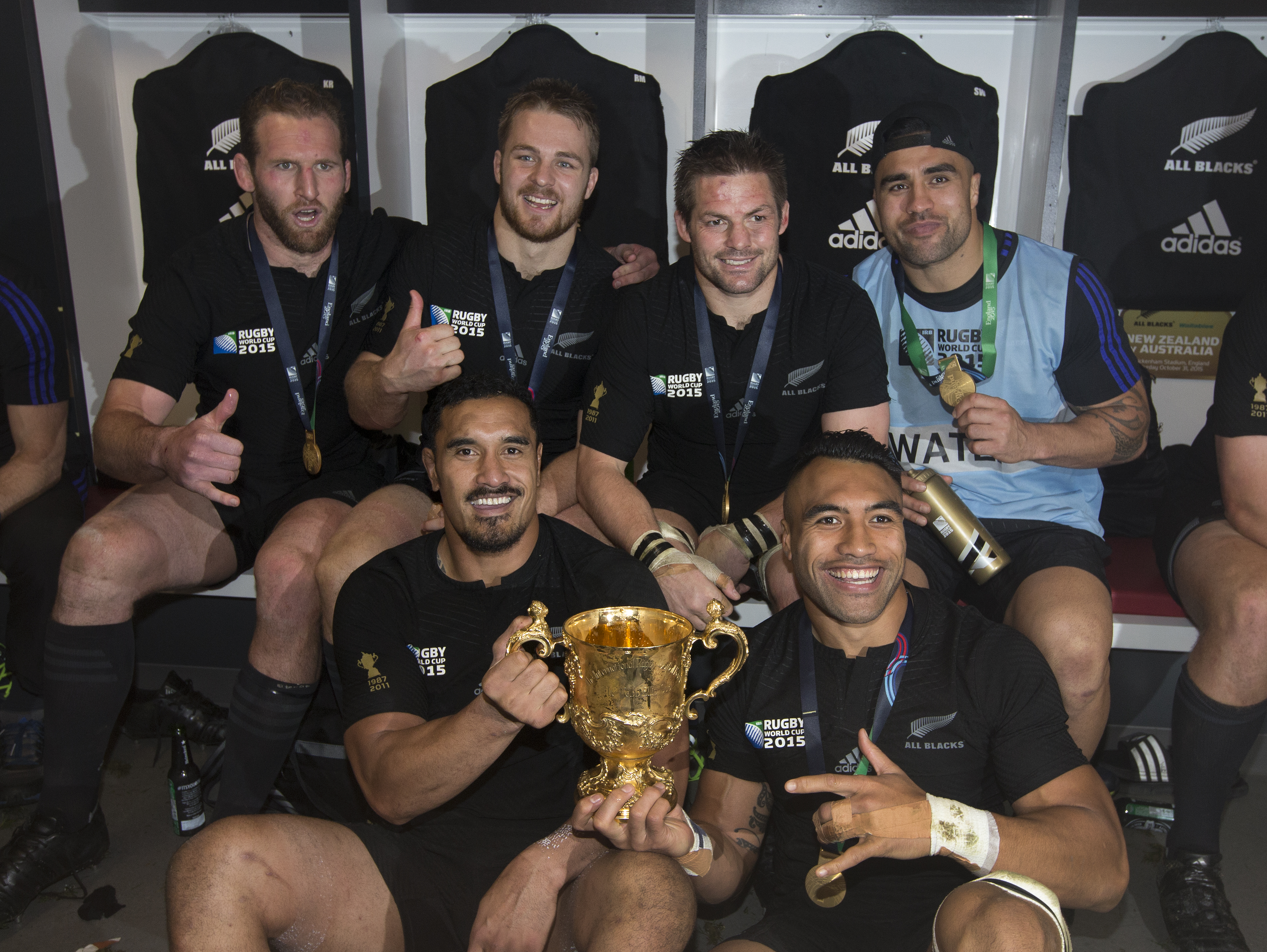 New Zealand All Blacks loose forwards, Kieran Read, Jerome Kaino, Sam Cane, Richie McCaw, Victor Vito and Liam Meesam, with the Webb Ellis Cup. Photo / Brett Phibbs.