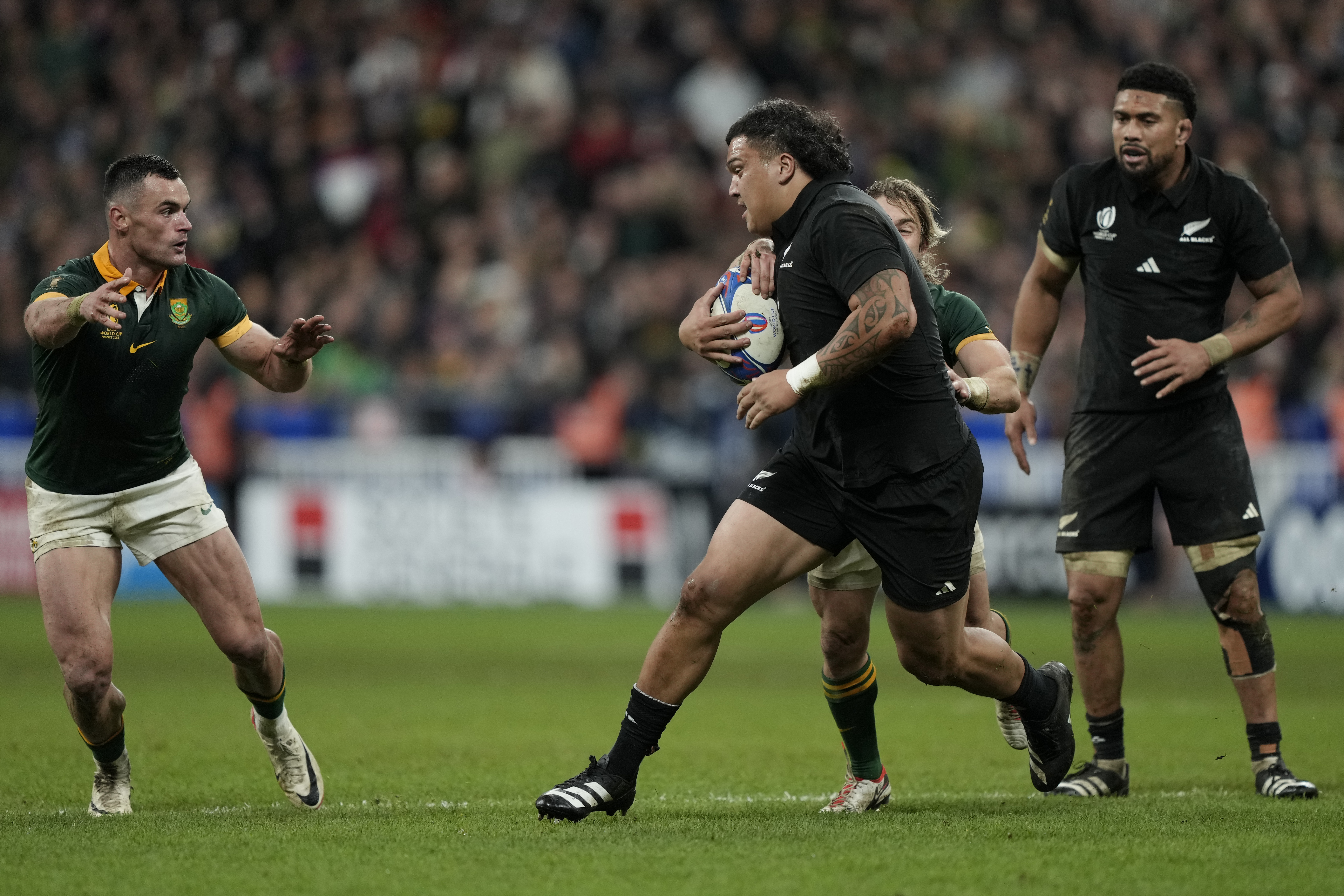 Rugby greats, former All Blacks Ian Jones and Eric Rush, said Tamaiti Williams [pictured with the ball] should be proud of his performance in the second half of the Rugby World Cup final. Photo / AP