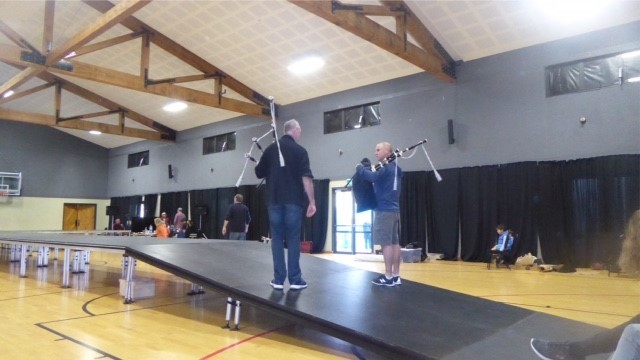 Pipers Bain McGregor (left) and David Picketts plan their grand entrance for the Art 'N' Tartan show. Photo / Sue Welford