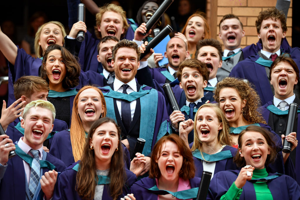 Richard Madden joins other graduates of the Royal Conservatoire of Scotland in celebration after receiving an honorary doctorate for his contribution to drama. Photo / Getty Images
