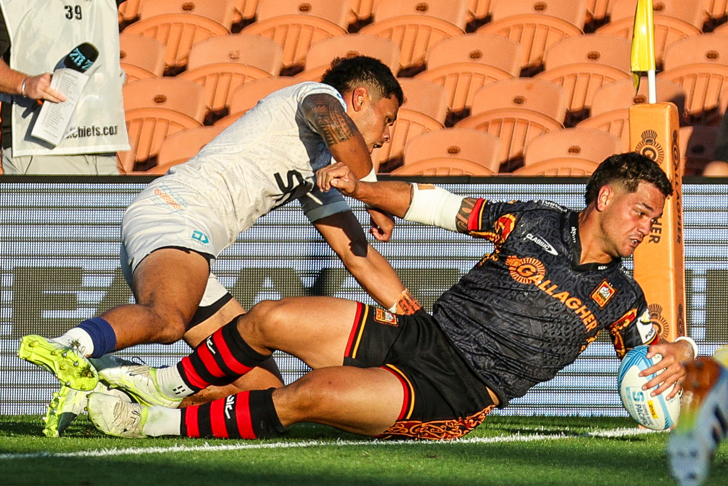 Chiefs' Quinn Tupaea scores a try during the Super Rugby clash against Moana Pasifika. Photo / Photosport