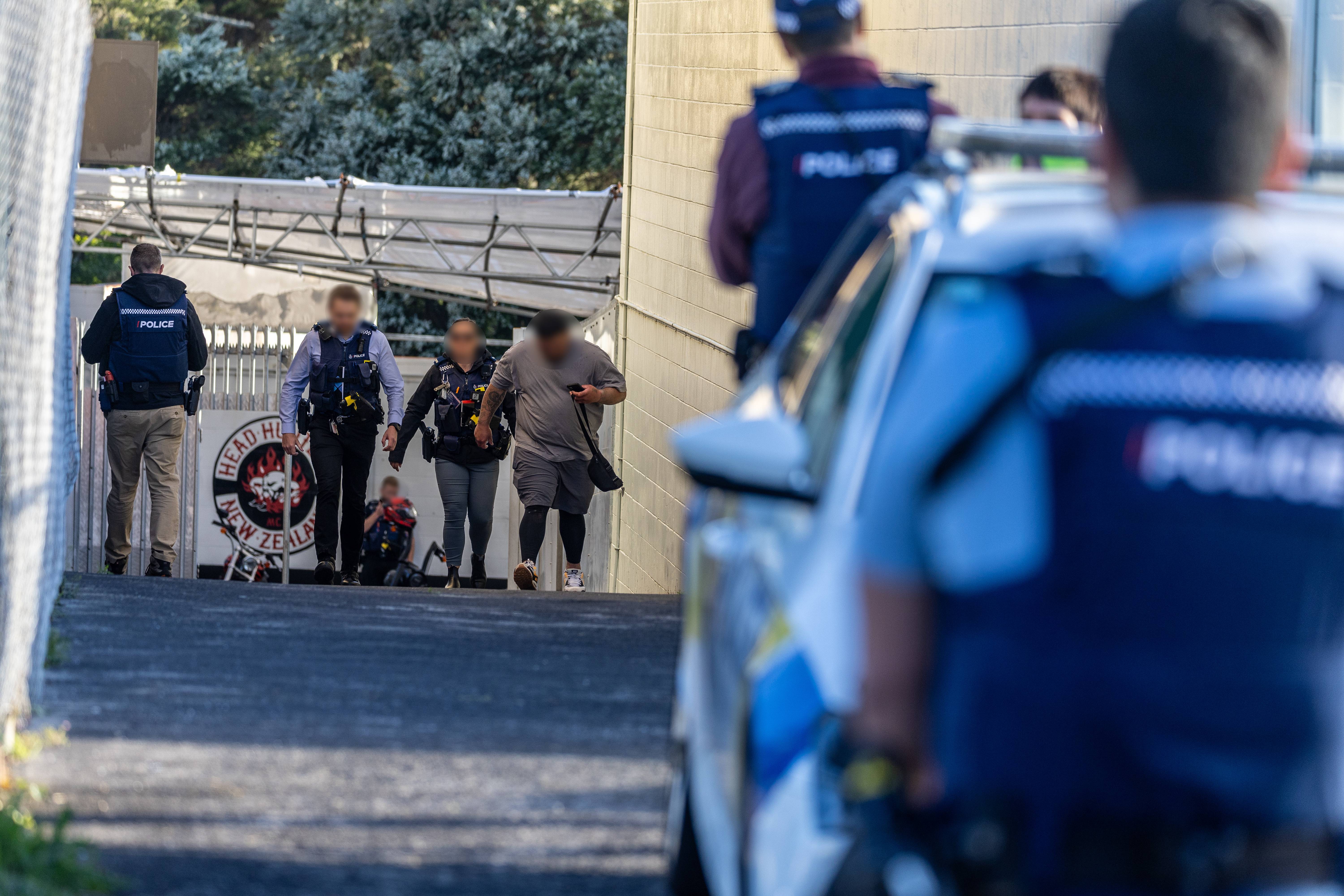 Police have executed a search warrant on the Head Hunters Motorcycle Club gang pad on View Rd in Henderson this morning. Photo / Michael Craig