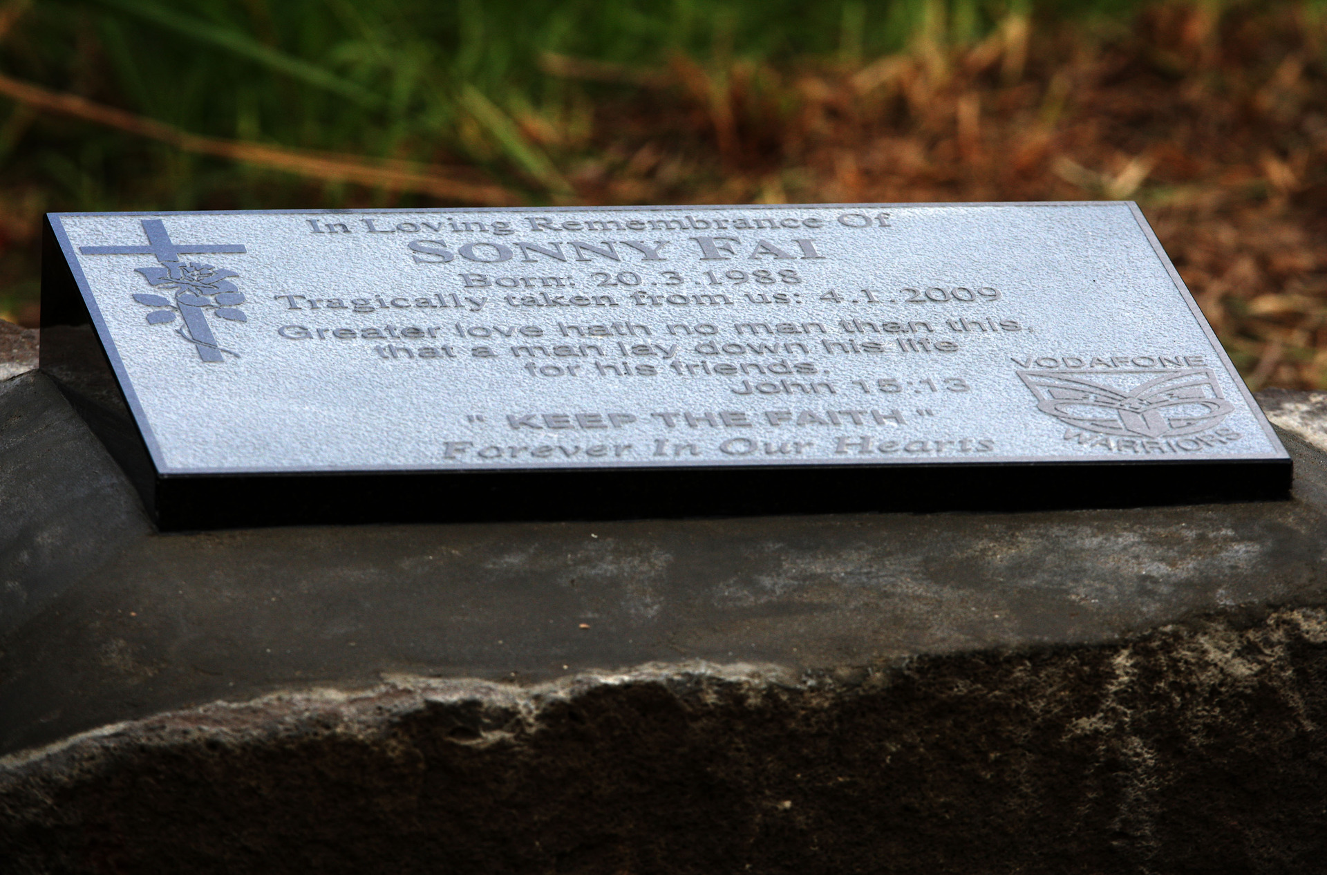 The plaque installed at the entrance to Bethells beach. Photo / Photosport