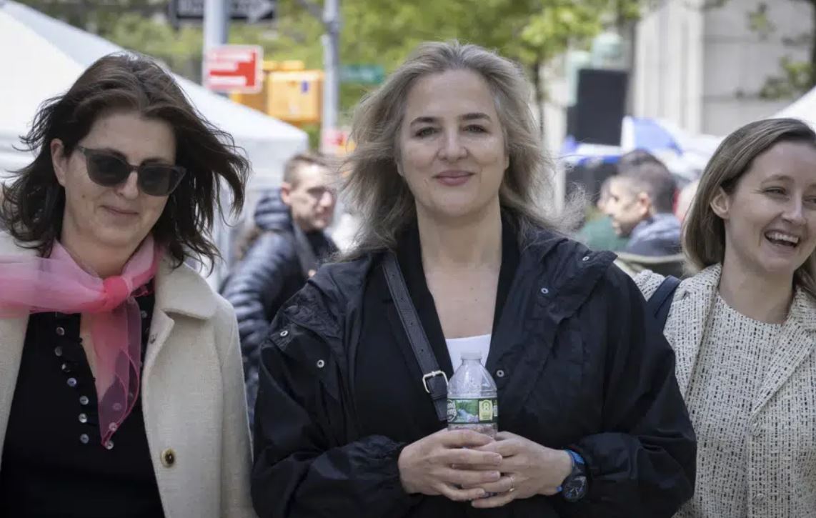 Natasha Stoynoff walks outside federal court in New York. Photo / AP