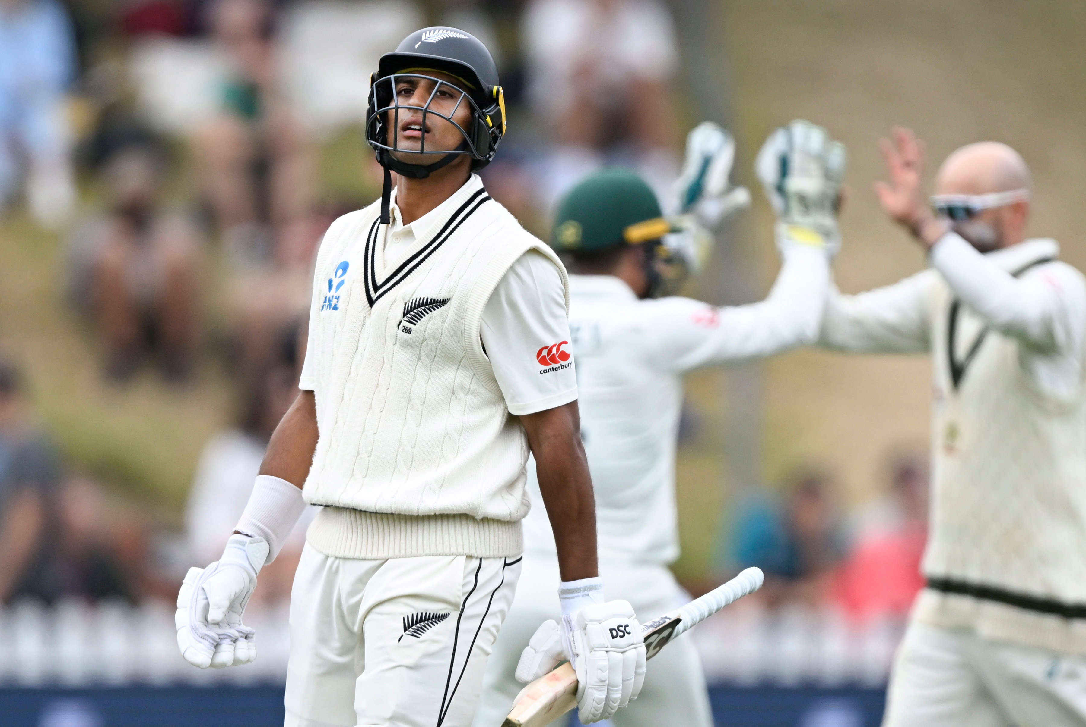 Rachin Ravindra heads back to the dressing room on day four. Photo / Photosport
