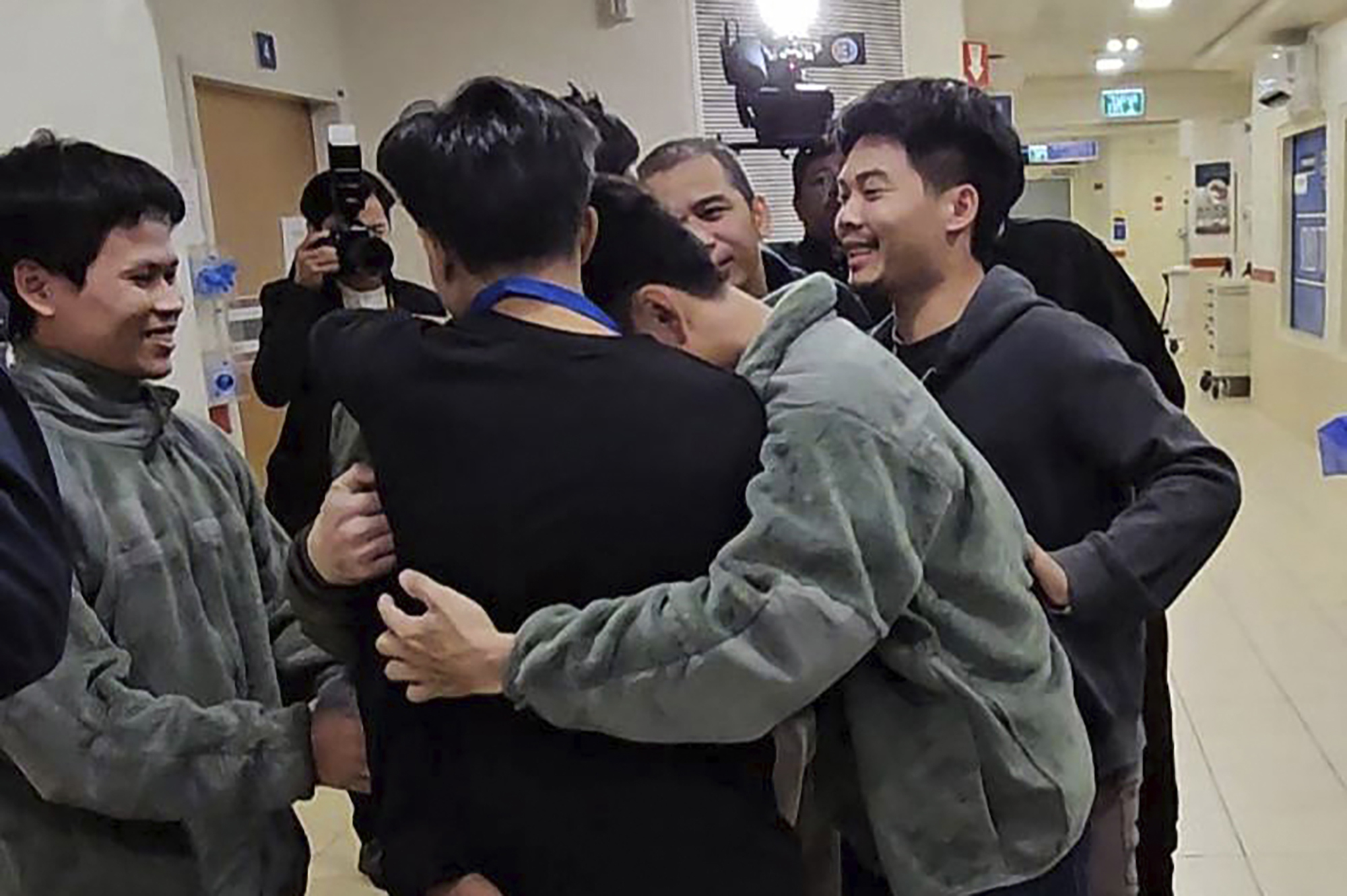 Thai hostages, who were previously released, hug their newly-freed compatriots at the Shamir Medical Center in Israel. Photo / AP