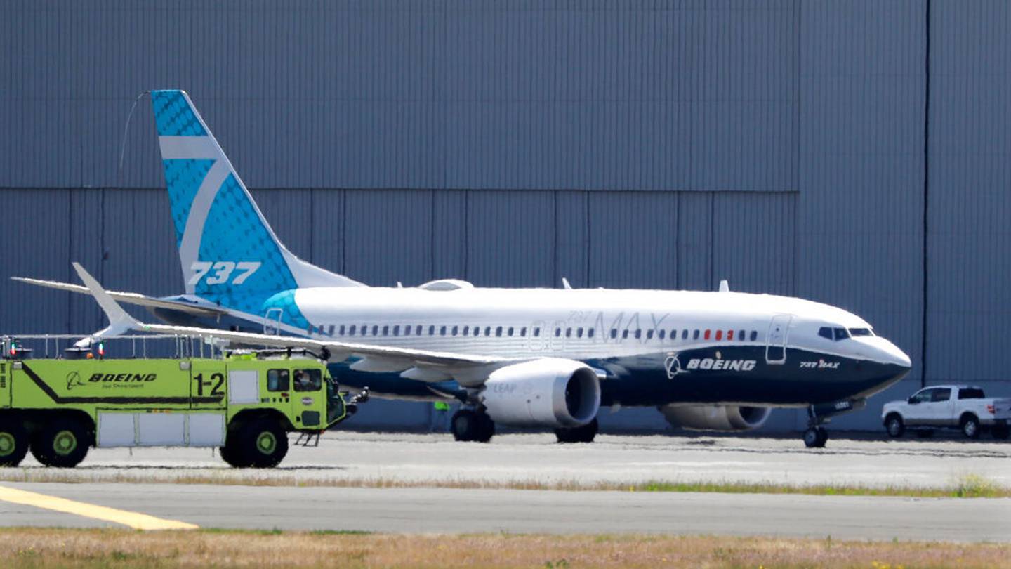 A Boeing 737 MAX jet taxis after landing at Boeing Field following a test flight in Seattle. Photo / AP