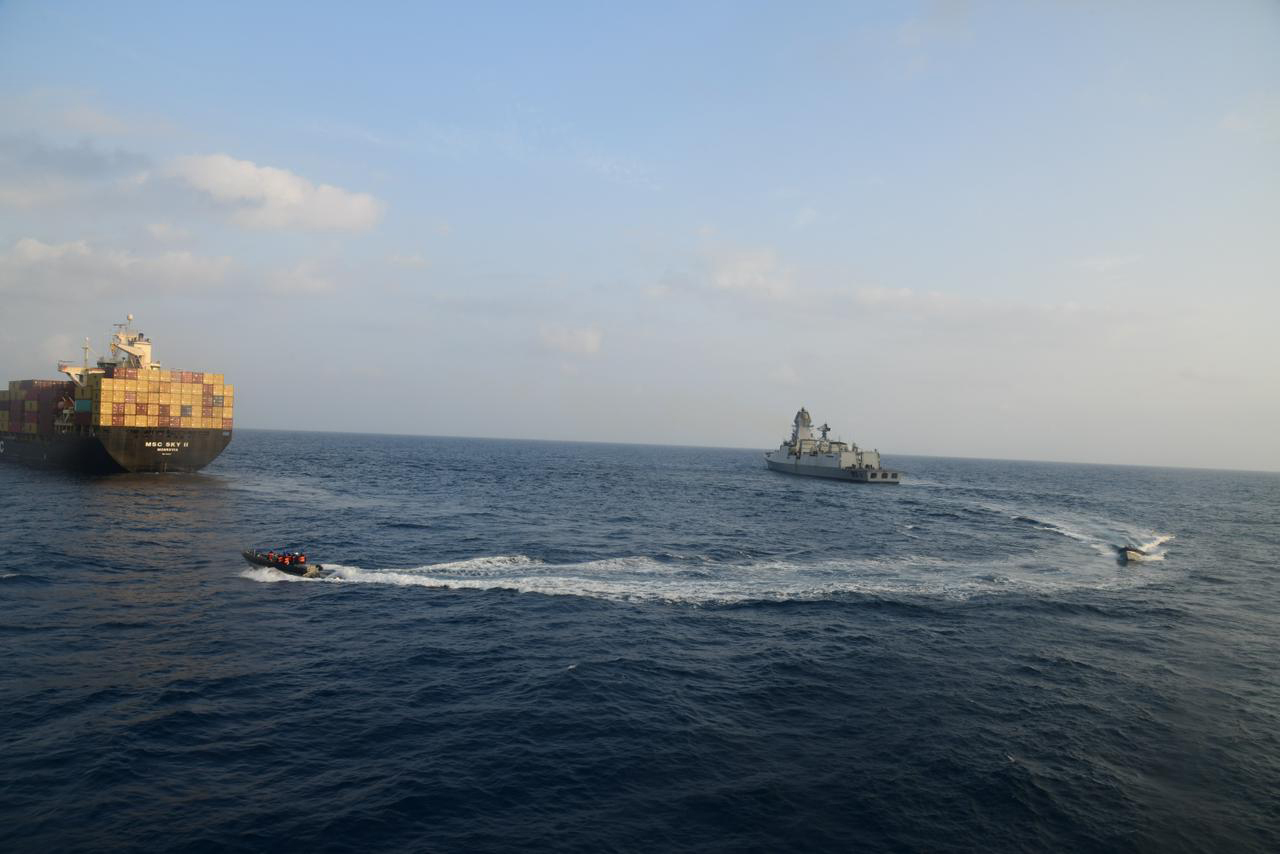 This photograph shared by Indian navy on the X platform shows a firefighting team from Indian Navy vessel INS Kolkata responding to a fire on Liberian-flagged Merchant ship MSC Sky II caused due to a suspected drone/missile attack in the Gulf of Aden. Photo / AP