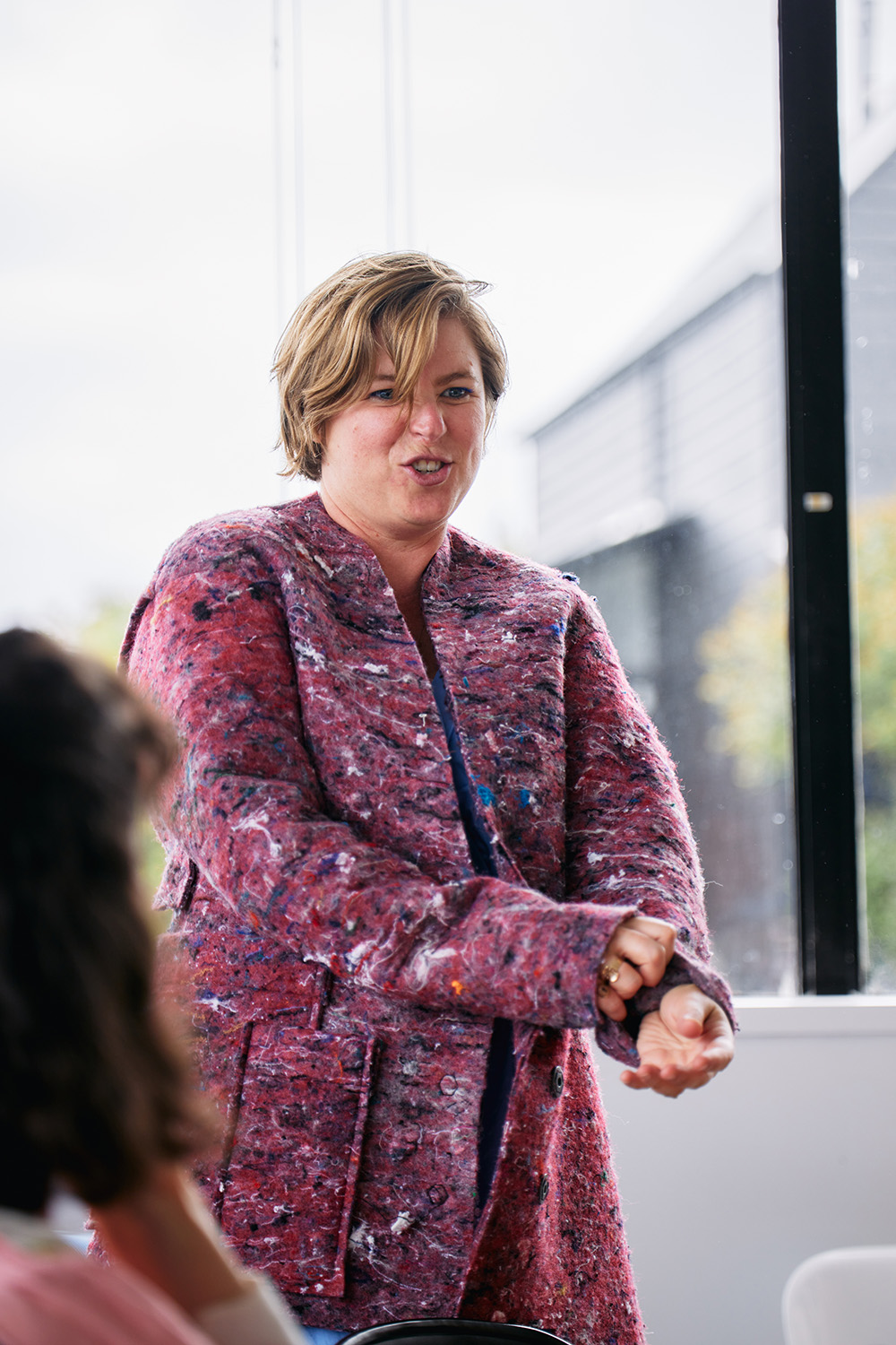 Emily Miller Sharma, co-founder of Mindful Fashion and general manager of Ruby and Liam, tries on William’s jacket, during the design awards judging.
