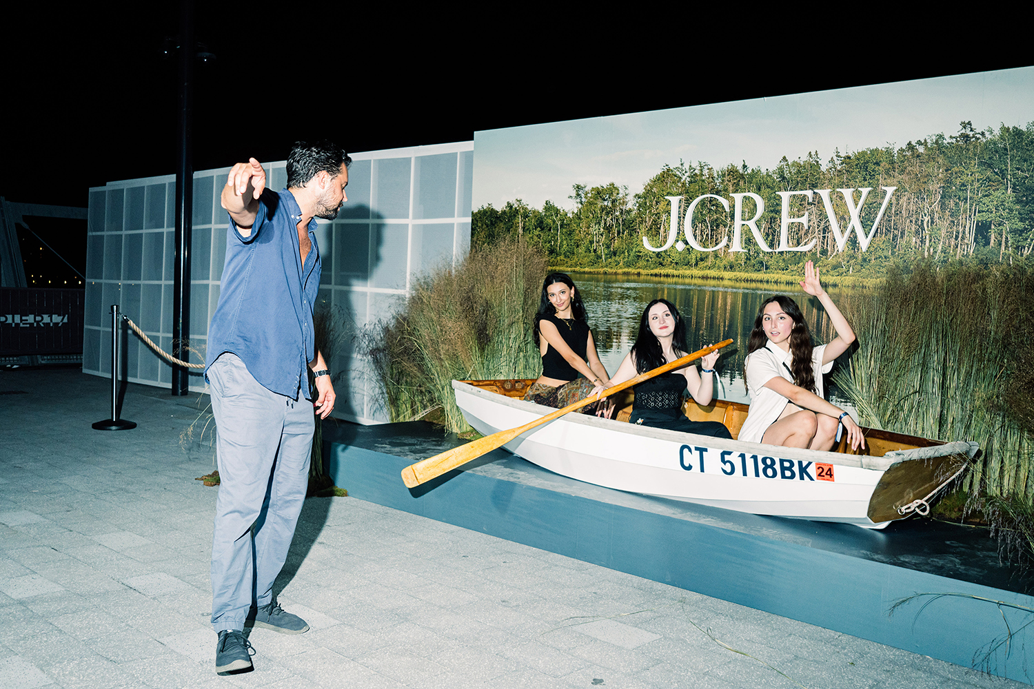 Attendees pose for a photo as J. Crew celebrates its 40th anniversary in New York in September. Photo / Jutharat Pinyodoonyachet, The New York Times