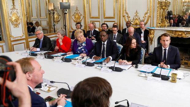 Prime Minister Jacinda Ardern with world leaders including French President Emmanuel Macron while in Paris last year for the Christchurch Call summit. Photo / AFP