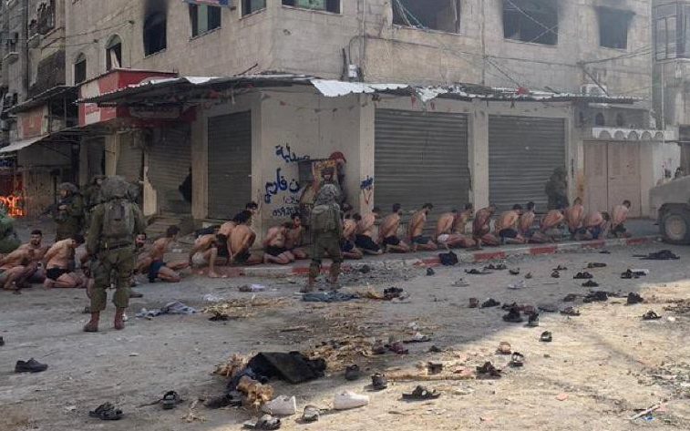One report says the suspects were stripped to ensure they were not carrying weapons. Photo / EMANUEL FABIAN / X / TWITTER