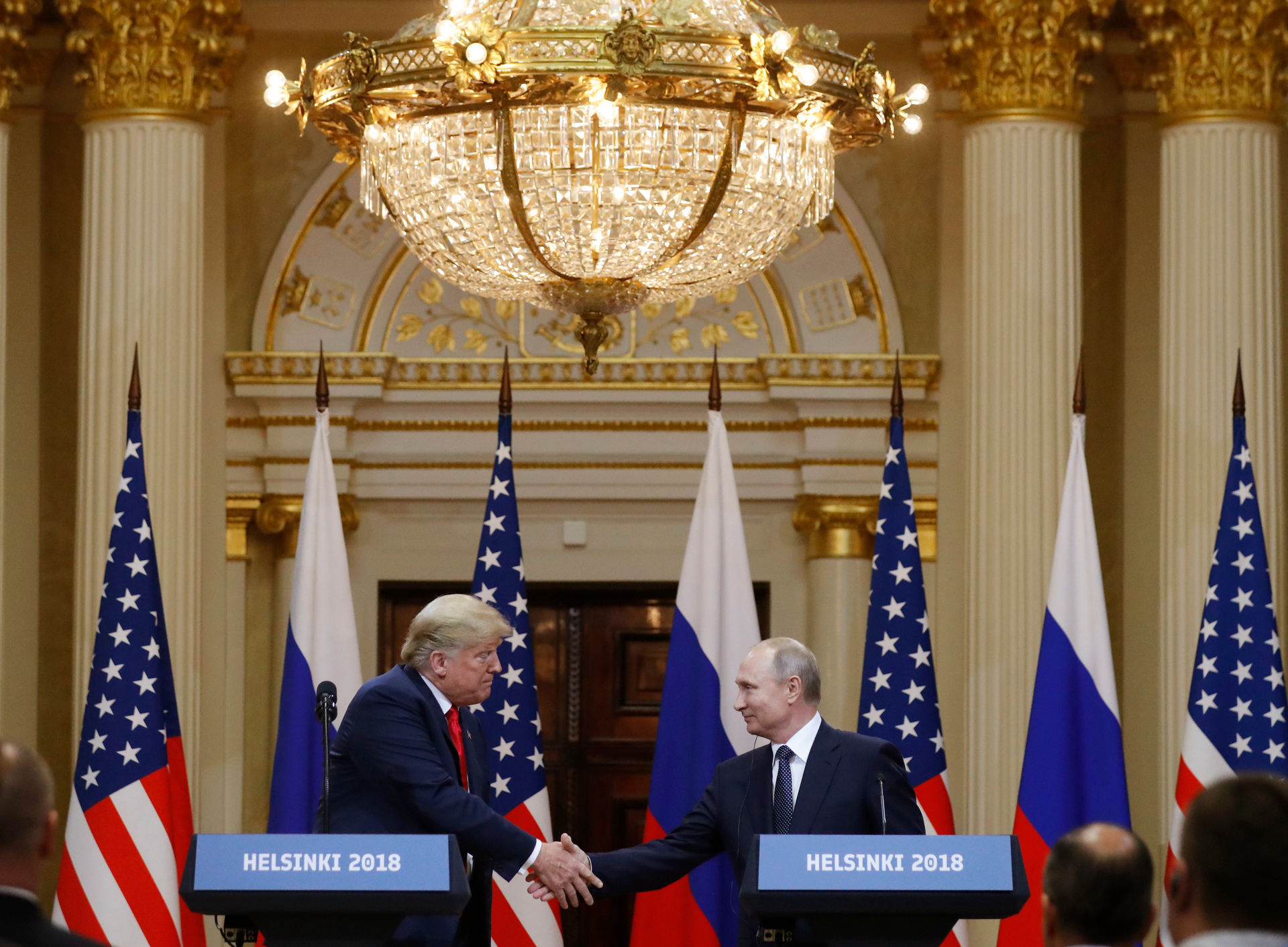US President Donald Trump shakes hand with Russian President Vladimir Putin during a press conference after their meeting at the Presidential Palace in Helsinki. Photo / AP