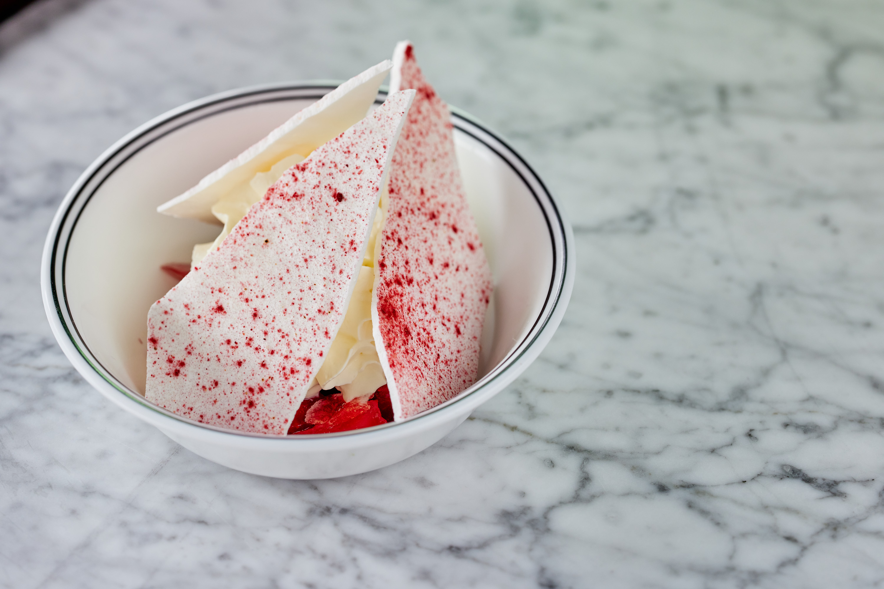 Strawberries, meringue and buffalo yoghurt mousse. Photo / Babiche Martens