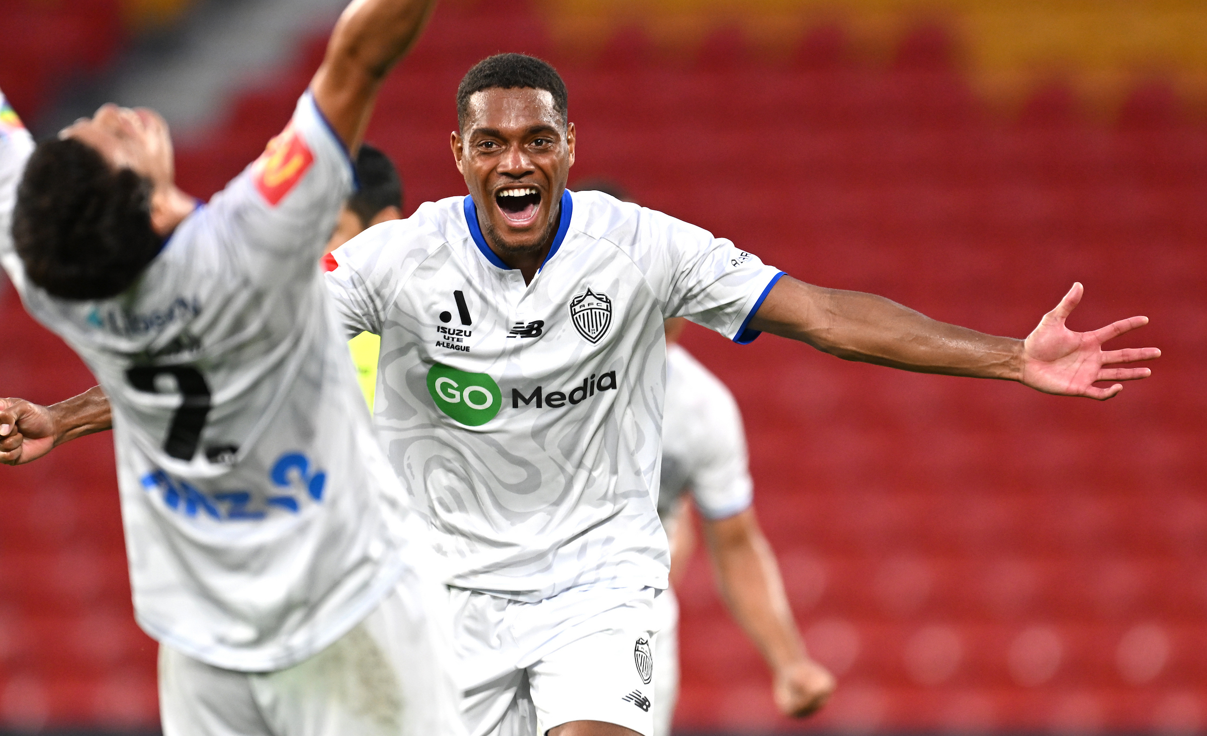 Auckland FC's Dan Hall celebrates the goal of Hiroki Sakai (left) during their A-League match against Brisbane Roar last weekend. Photo / AAP Image / Dave Hunt / Photosport