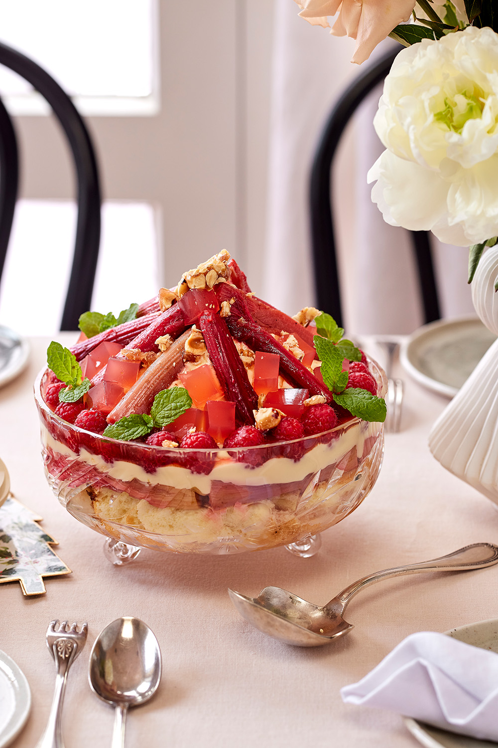 Create a showstopping rhubarb and raspberry custard trifle for dessert. Photo / Babiche Martens