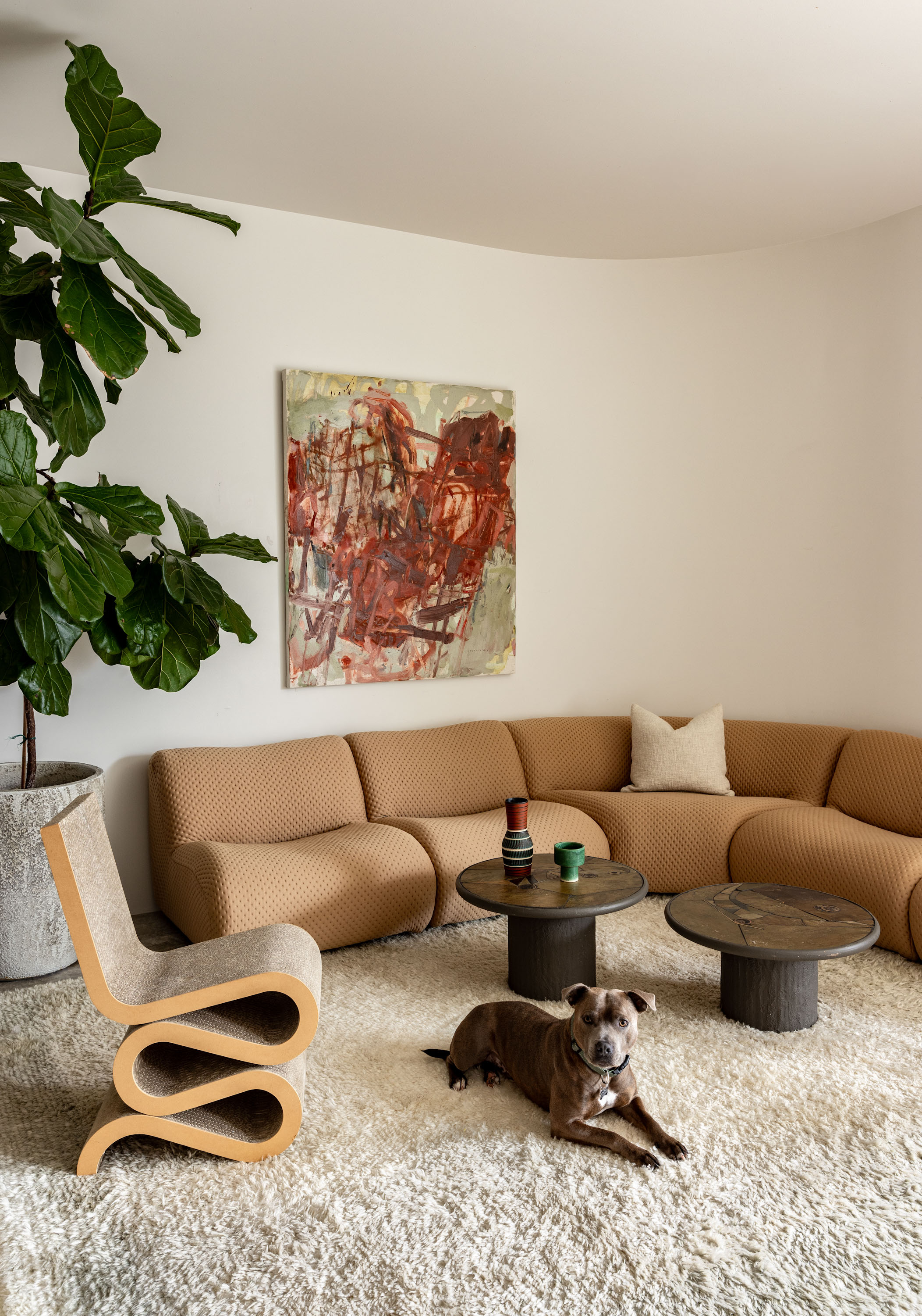 Another gorgeous room, this one featuring a 1977 sofa from King Living and a Wiggle Chair designed by Frank Gehry. The 1970s tiled coffee tables are in the style of Paul Kingma. The artwork is 'Almandine' by Jacqui Colley from Orexart Gallery. Photo / Babiche Martens