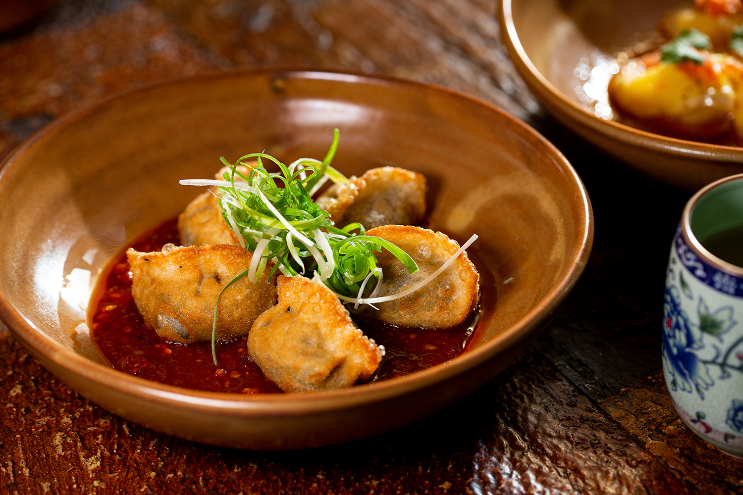 Scallop wontons with Sichuan oil.  Photo / Babiche Martens