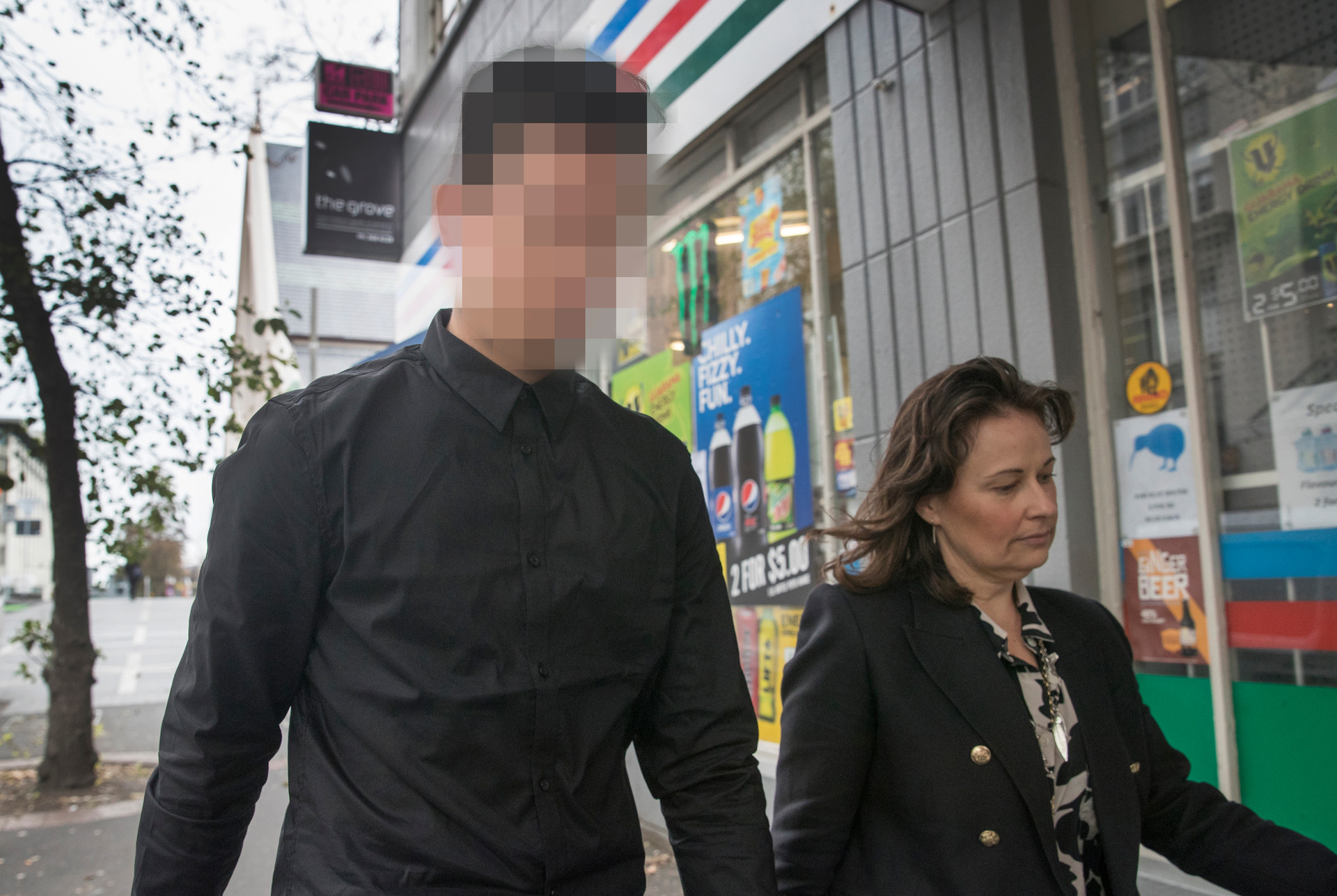 The accused outside the Auckland District Court with his lawyer Emma Priest. Photo / Brett Phibbs