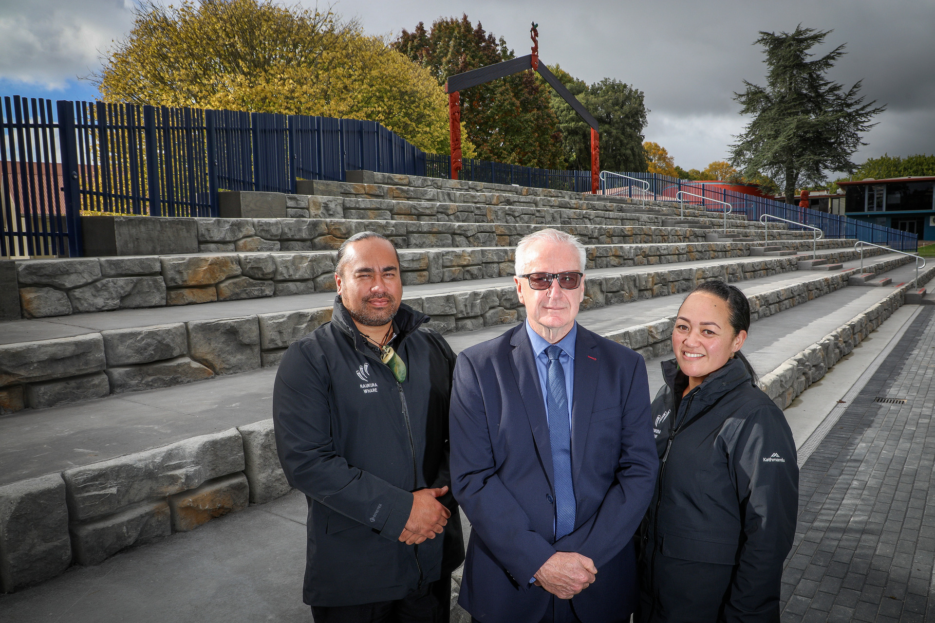 Rotorua Boys' High School director of Māori performing arts Jamus Webster (left), principal Chris Grinter (centre) and deputy principal Rie Morris at the school's new terraces in 2021. Photo / Andrew Warner