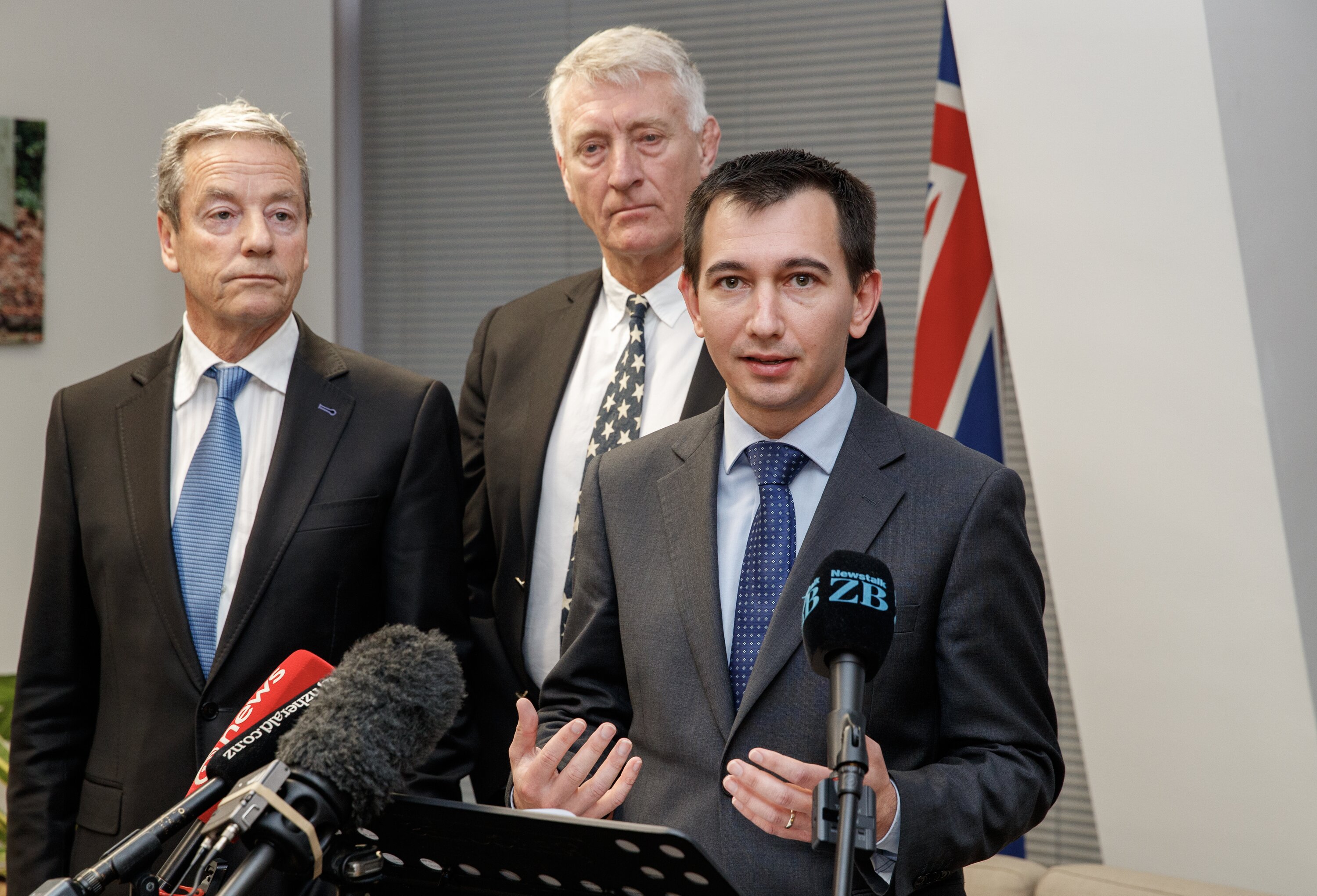 Local Government Minister Simeon Brown, right, with Commerce and Consumer Affairs Minister Andrew Bayly, left, and Local Government Funding Agency chairman Craig Stobo announcing the new borrowing regime. Photo / Mark Mitchell