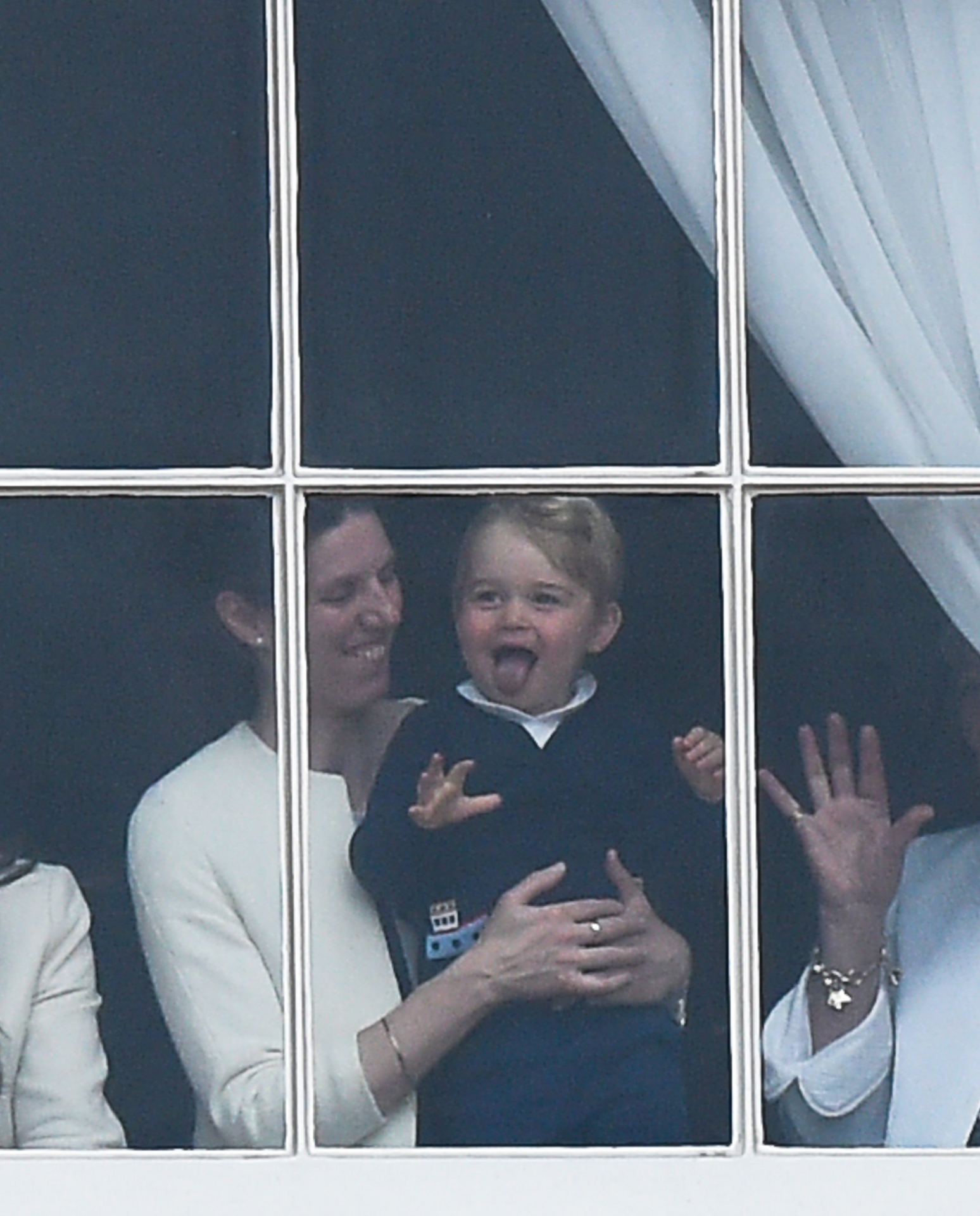 Prince George of Cambridge poked his tongue out at the 2015 Trooping the Colour crowds. Photo / Getty Images
