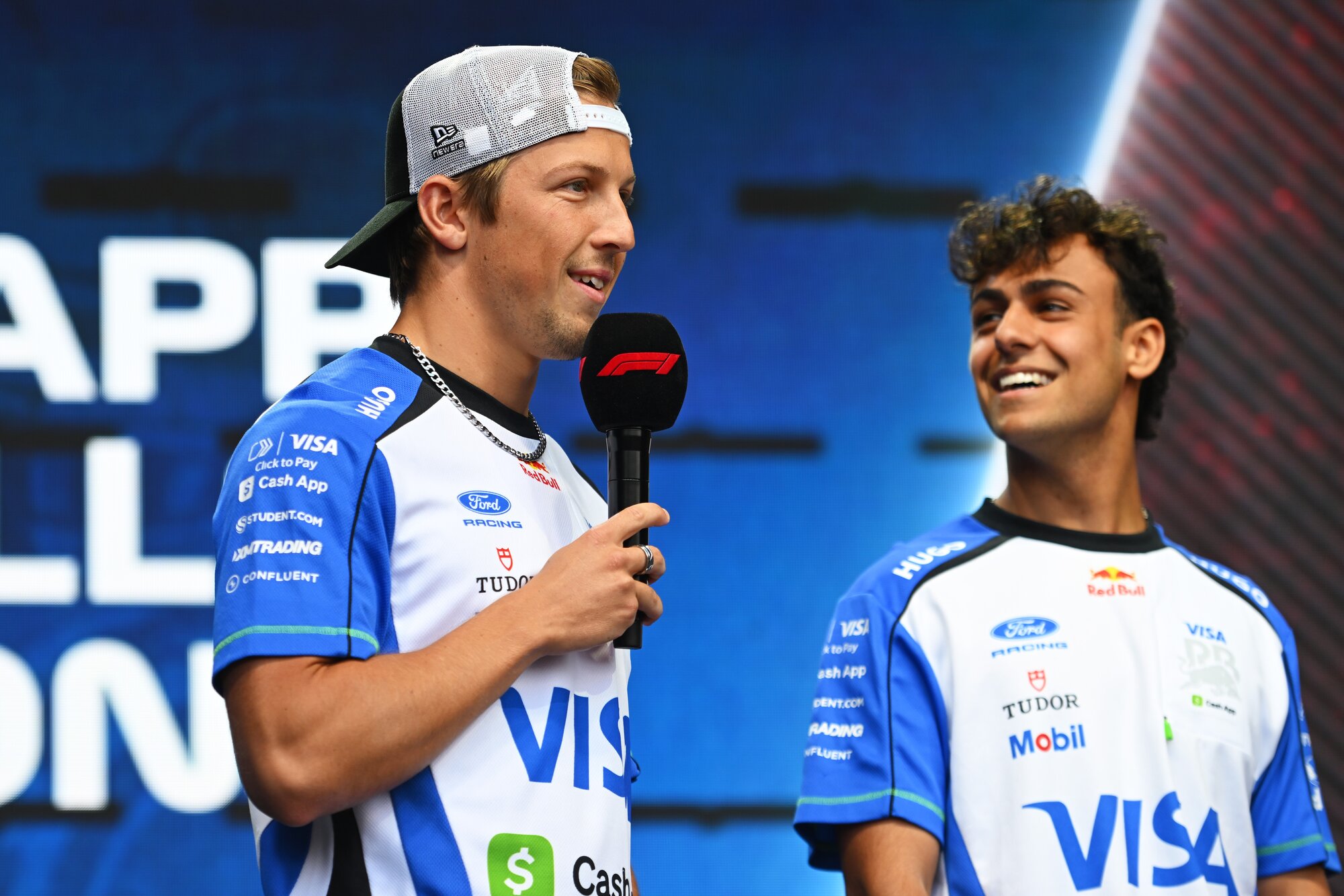 Liam Lawson and Racing Bulls teammate Arvid Lindblad talk to fans at the Hungarian Grand Prix. Photo / Red Bull