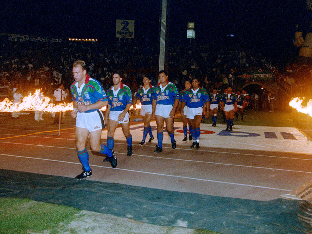 Dean Bell leads the Warriors out ahead of their first ever game in 1995. Photo / Photosport
