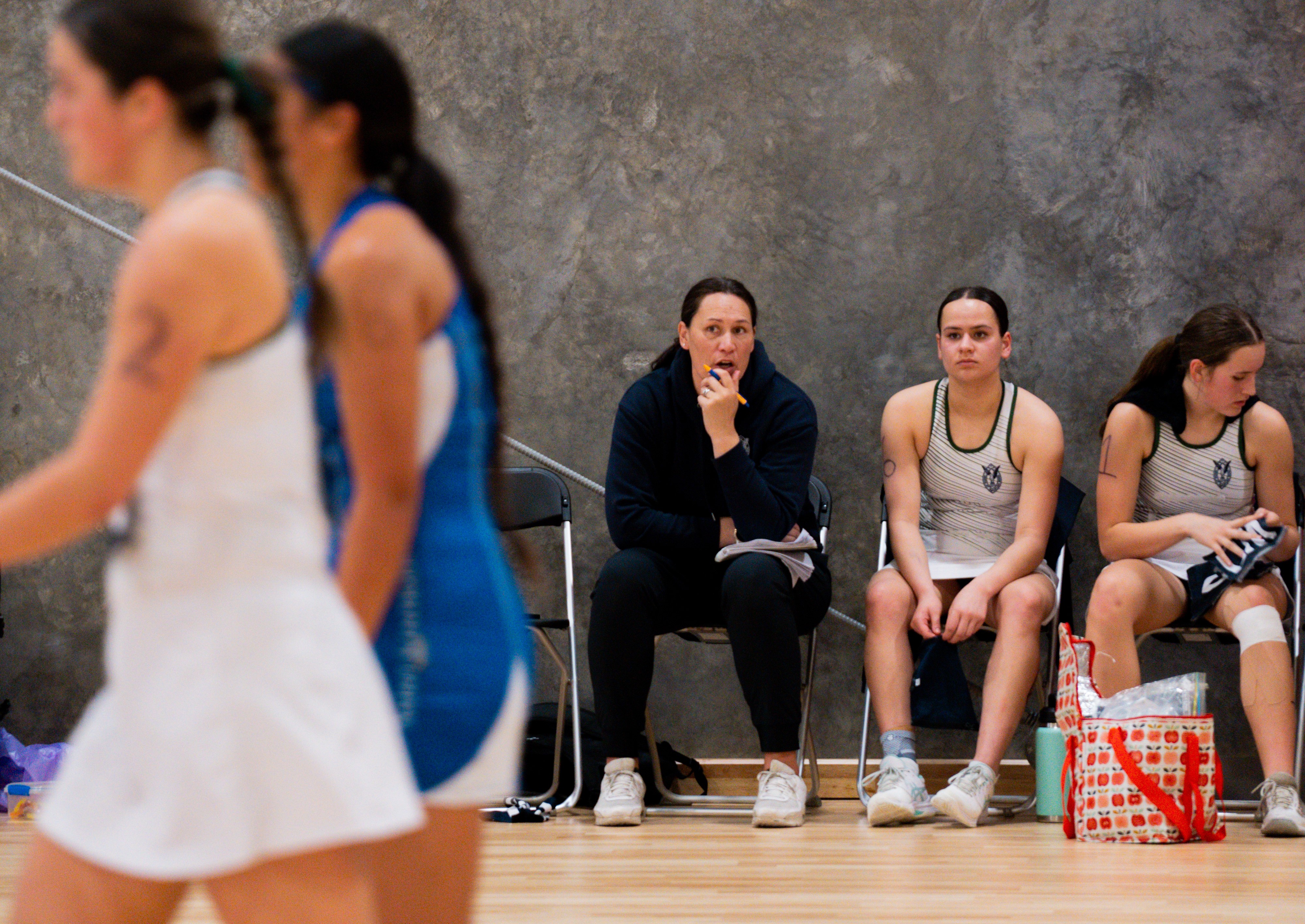 Former Silver Fern Jodi Brown taking notes as her Columba College side takes on St Kentigern College in Christchurch. Photo / Netball New Zealand