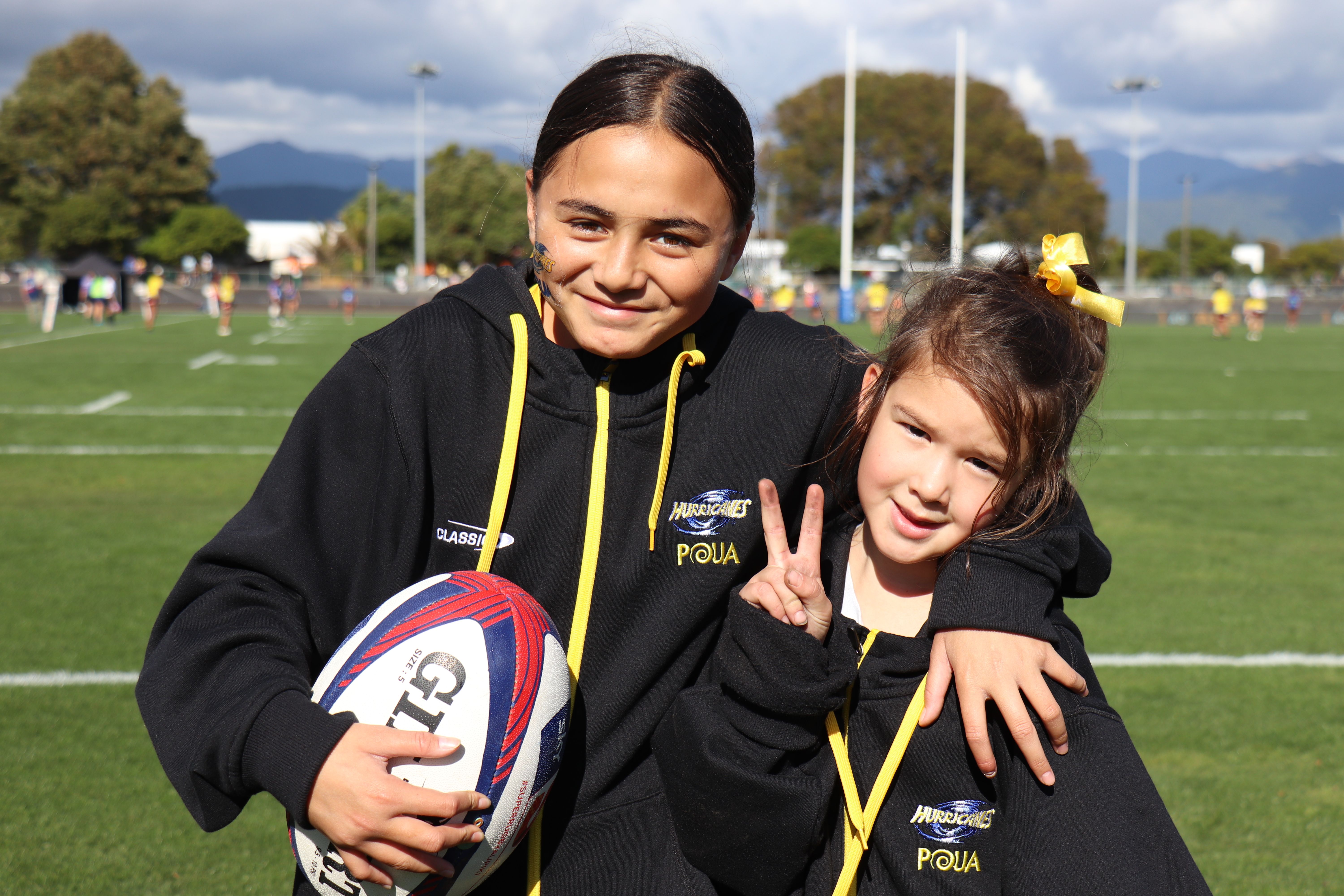 Esta Kauika and Willow Shelford were on ball retrieving duty at Levin Domain for the match between Hurricanes Poua and Blues.