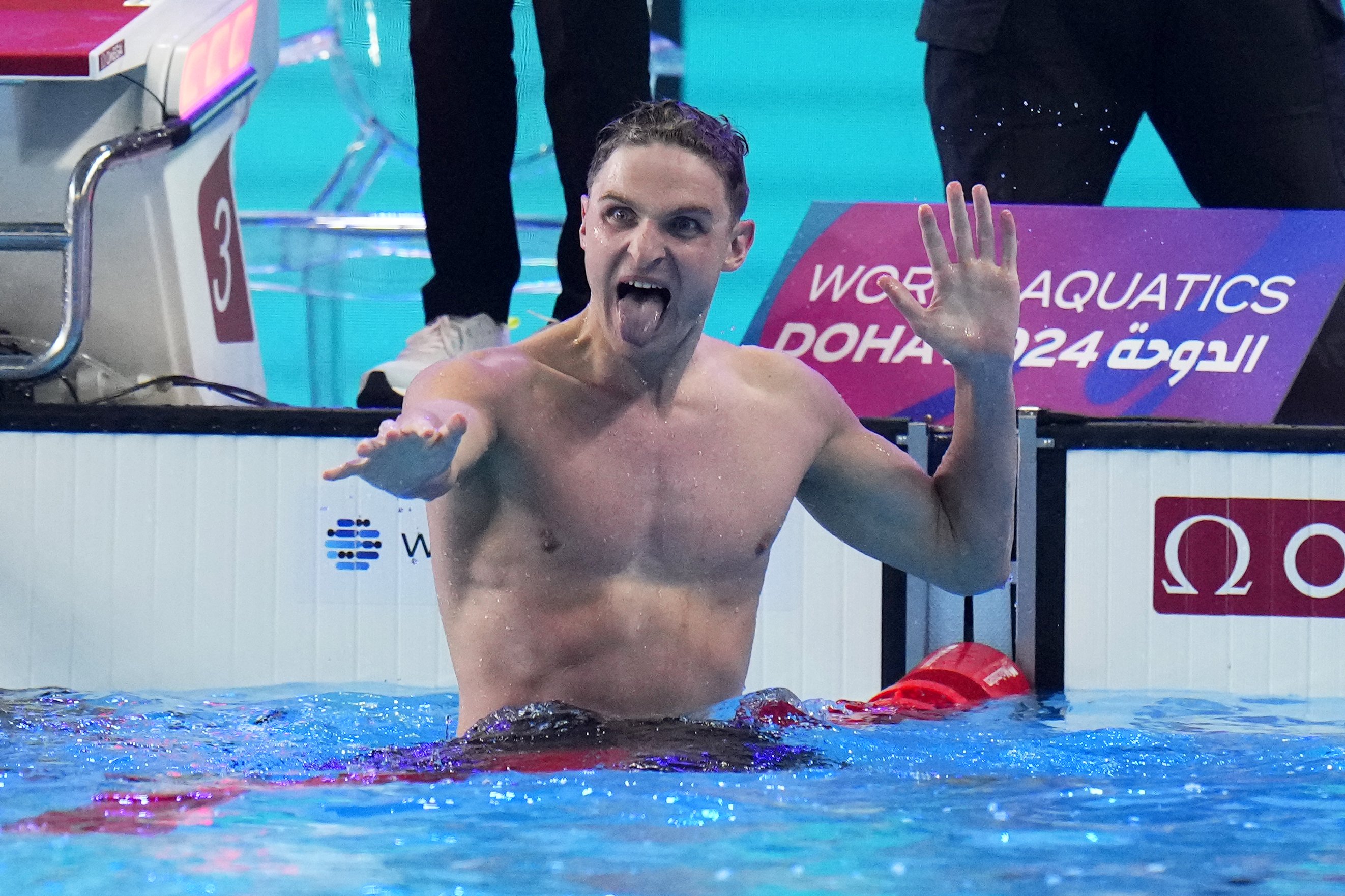 Lewis Clareburt reacts after winning the gold medal in the Men's 400m Individual Medley final at the World Aquatics Championships in Doha. Photo / AP