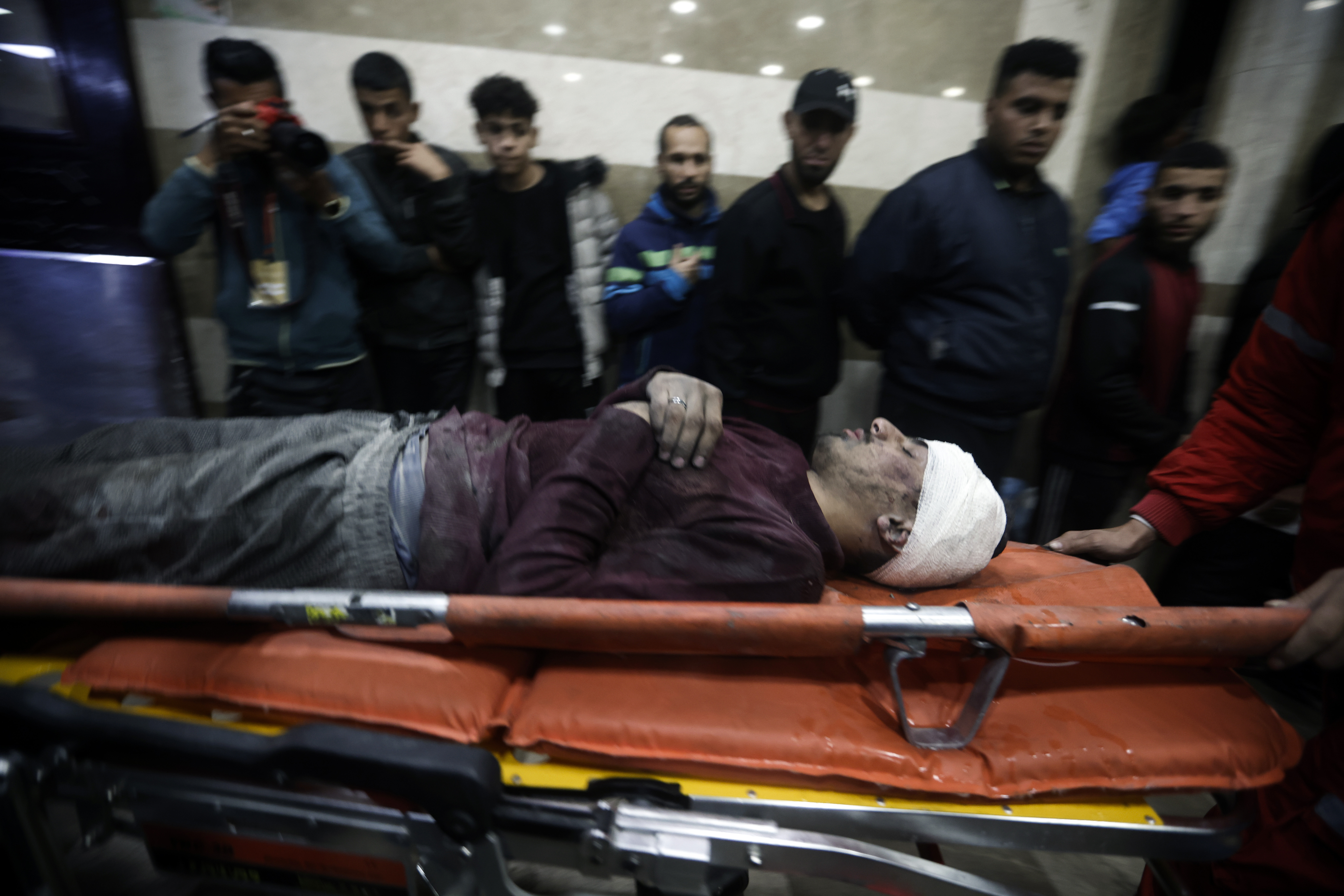 A Palestinian man wounded during the Israeli bombardment of the Gaza Strip is brought to the Nasser hospital in Khan Younis, Southern Gaza Strip. Photo / AP