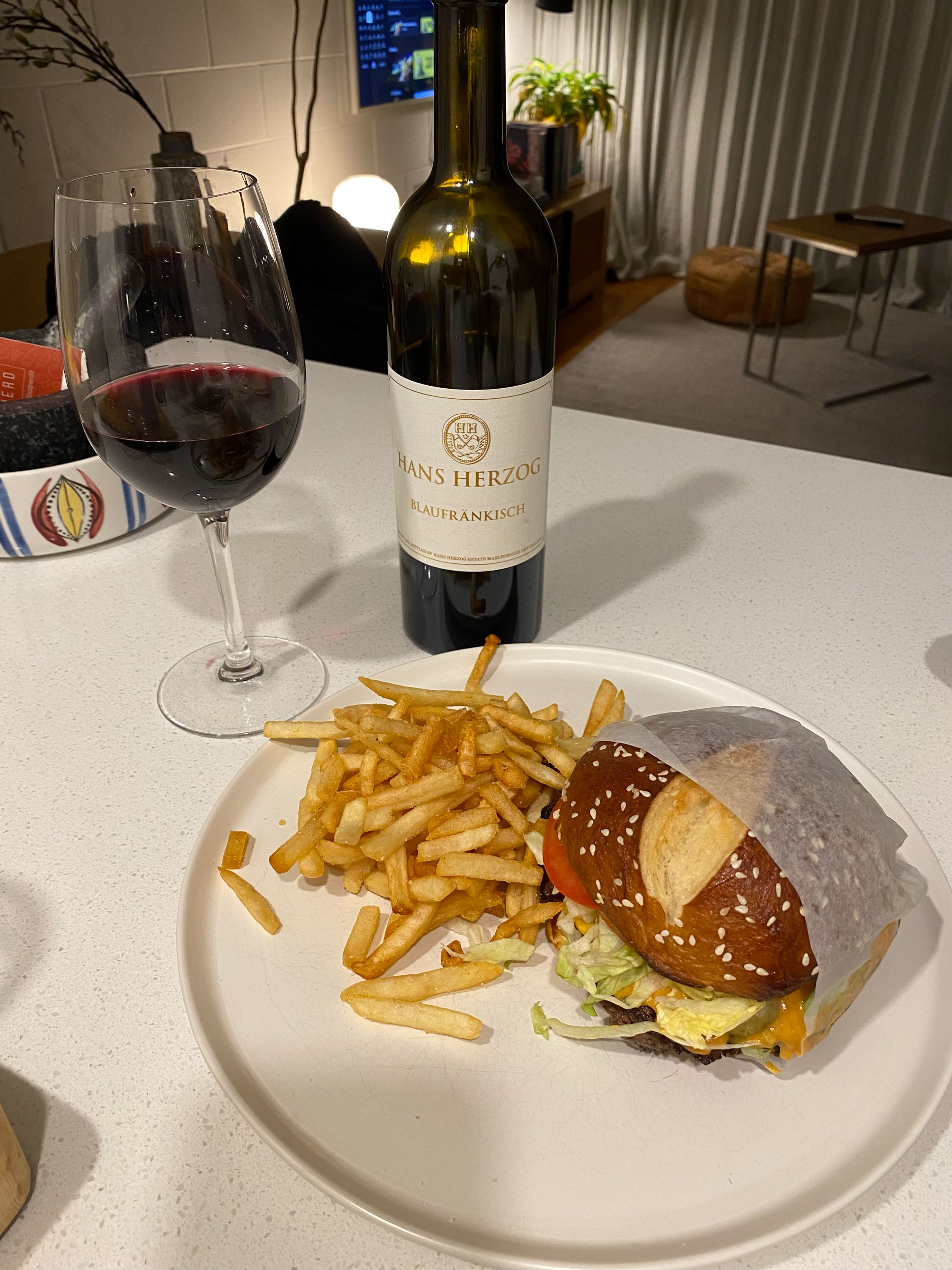 Hans Herzog Blaufrankisch and a double smash cheeseburger from Parade. Photo / Johanna Thornton
