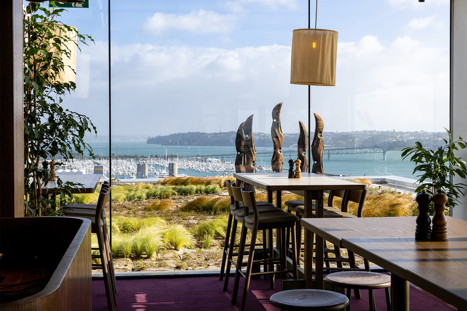 Queens rooftop bar and restaurant offers a 270-degree view of Auckland (and the Coromandel, on a good day). Photo / Babiche Martens